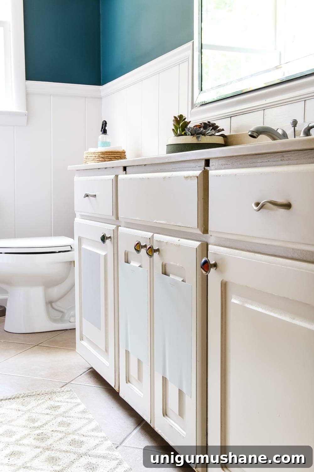 Painted Bathroom Cabinets Makeover: Before and After Reveal 5 Painted Cabinet Bathroom Update | blesserhouse.com - A dated cabinet gets a refresh with Benjamin Moore Coventry Gray for an inexpensive bathroom update. #cabinetpainting #homeimprovement #bathroom