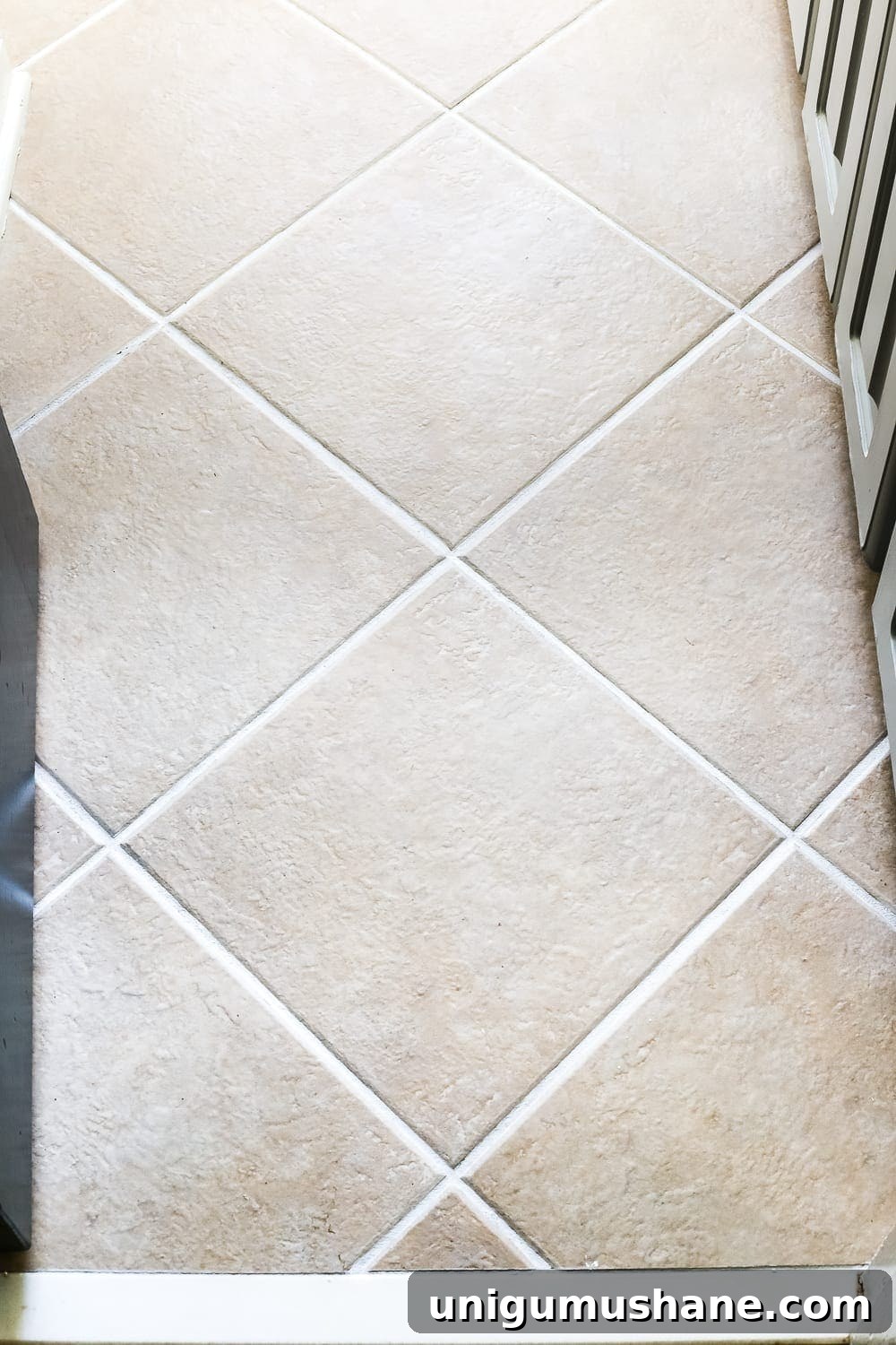 How to Refresh Tile Grout with Paint 8 Bathroom tile floor after cleaning and refreshing grout with a grout pen