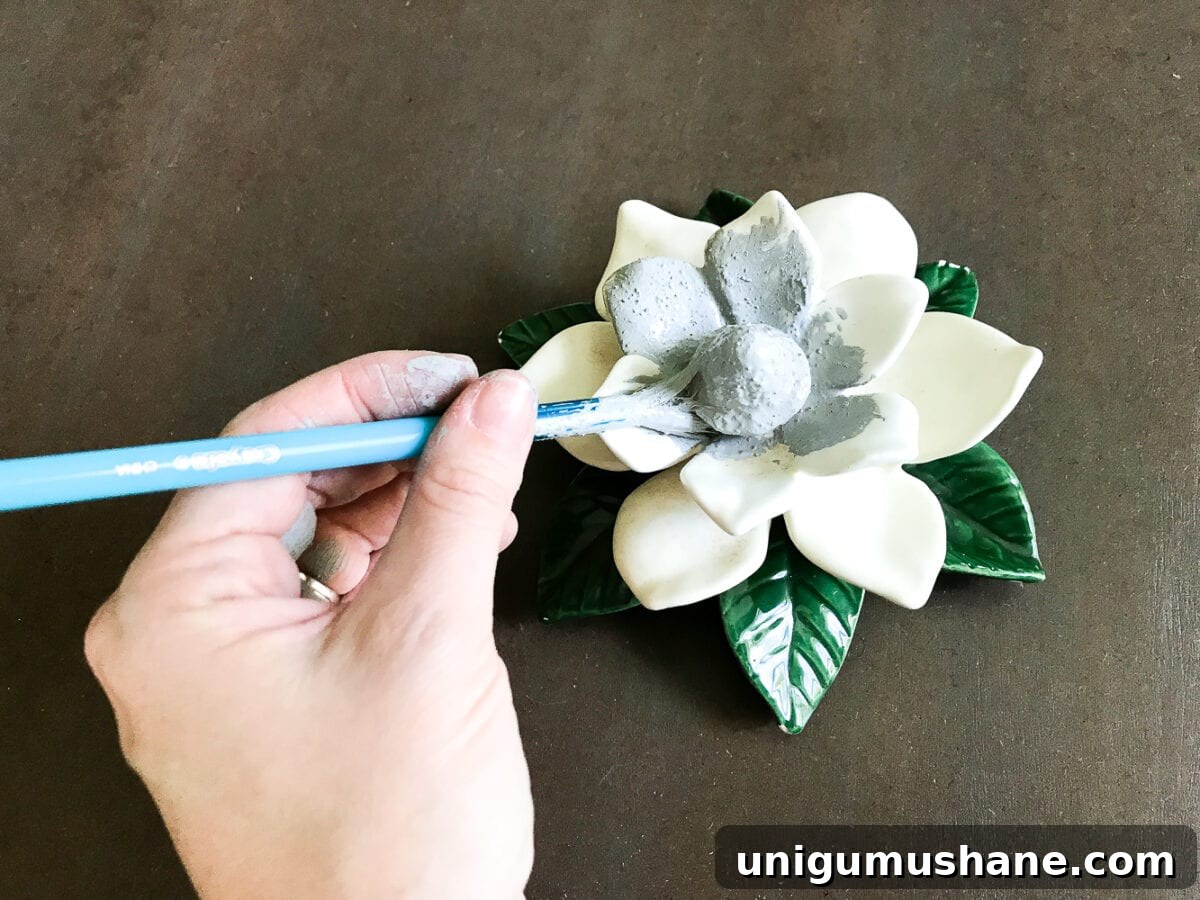 A quick and simple tutorial for how to make anything look like concrete with craft paint. #crafting #painting #thriftydecor 