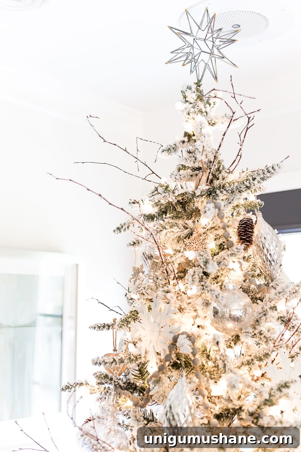 Christmas Living Room Decor Ideas for a Simple Seasonal Look 9 Seasonal Simplicity Christmas Living Room | blesserhouse.com - A tour of a neutral Christmas living room with simple, natural decor, mercury glass, and a modern rustic vibe. #christmaslivingroom #neutralchristmas #christmasdecor