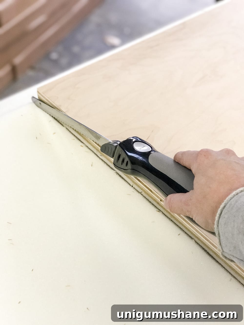 How to Turn a Coffee Table into an Ottoman Bench 9 Tracing plywood onto foam
