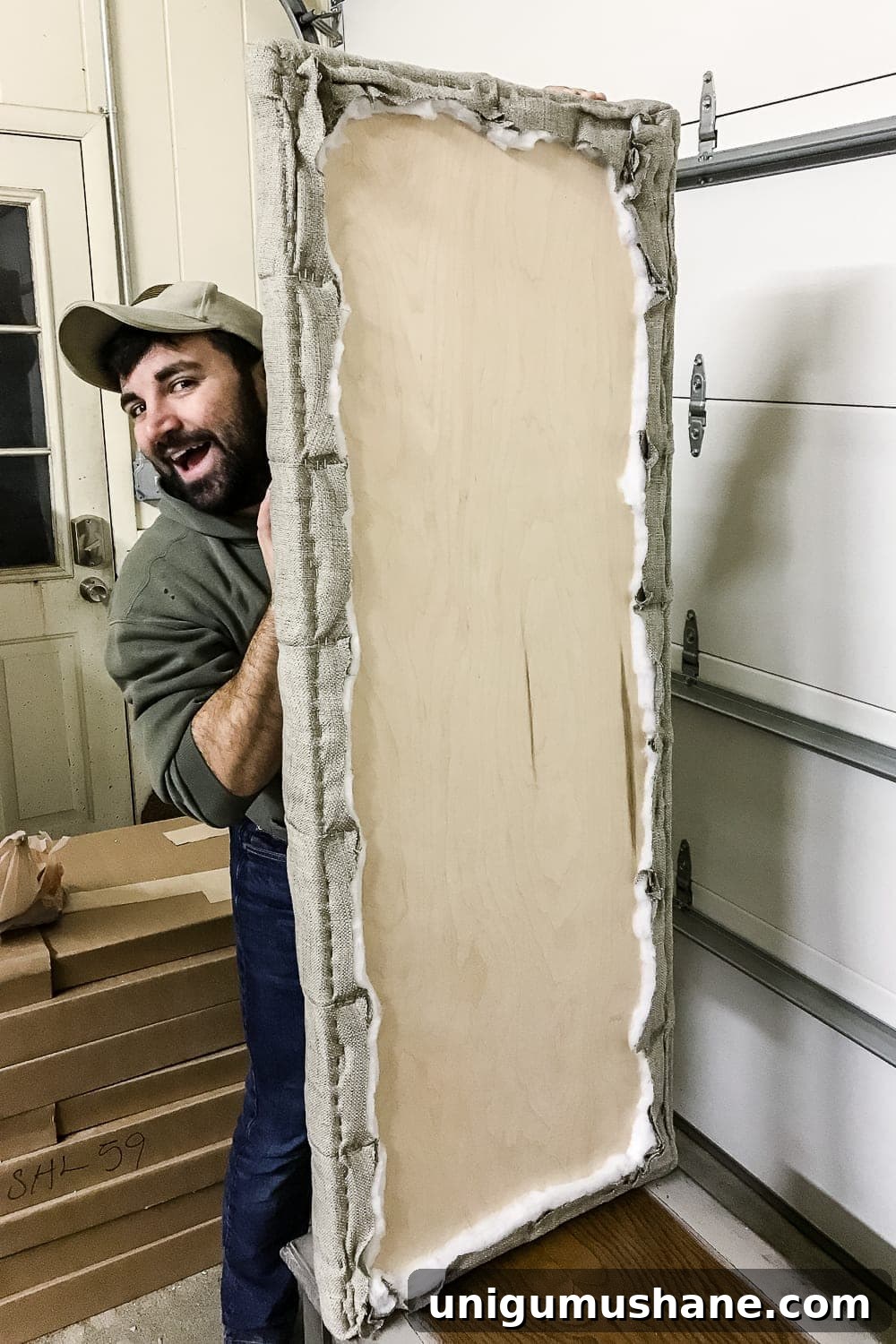 How to Turn a Coffee Table into an Ottoman Bench 16 Stapling fabric on underside