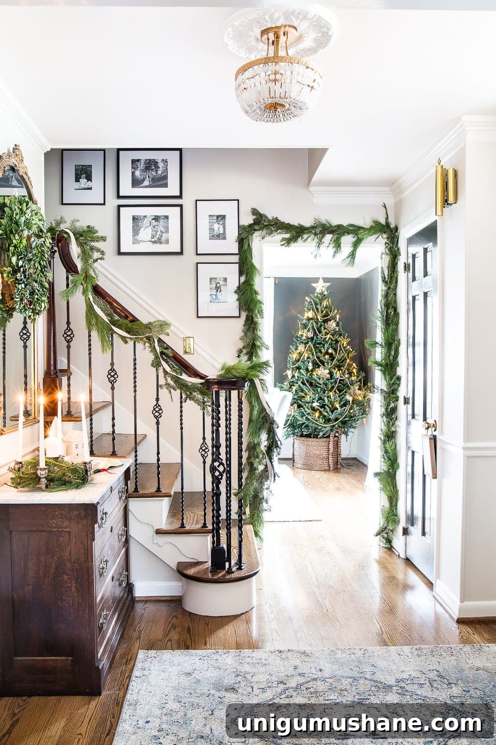 Classic Christmas Foyer Decorating Ideas 2 Classic Christmas Foyer | blesserhouse.com - A classic traditional entryway / foyer decorated for Christmas using fresh pine and holly greenery and a St. Lucia Day Advent wreath. #christmasfoyer #classicdecor #traditionalchristmas