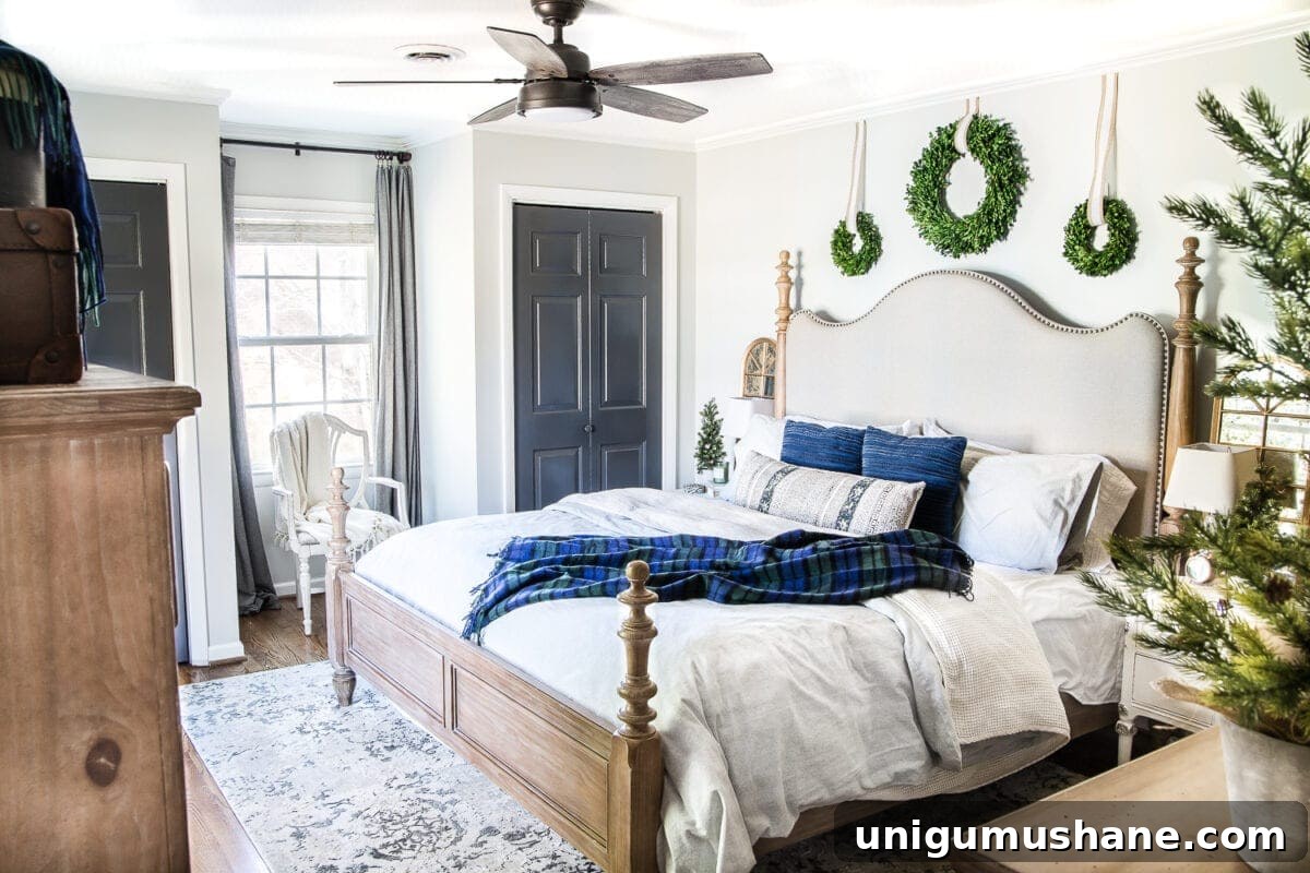 Cozy Blue and Neutral Christmas Bedroom Decor Ideas 2 Blue Christmas Bedroom | blesserhouse.com - A master bedroom decorated for Christmas with neutrals, blues, and greens that transitions easily into winter. #christmasbedroom #bluechristmas