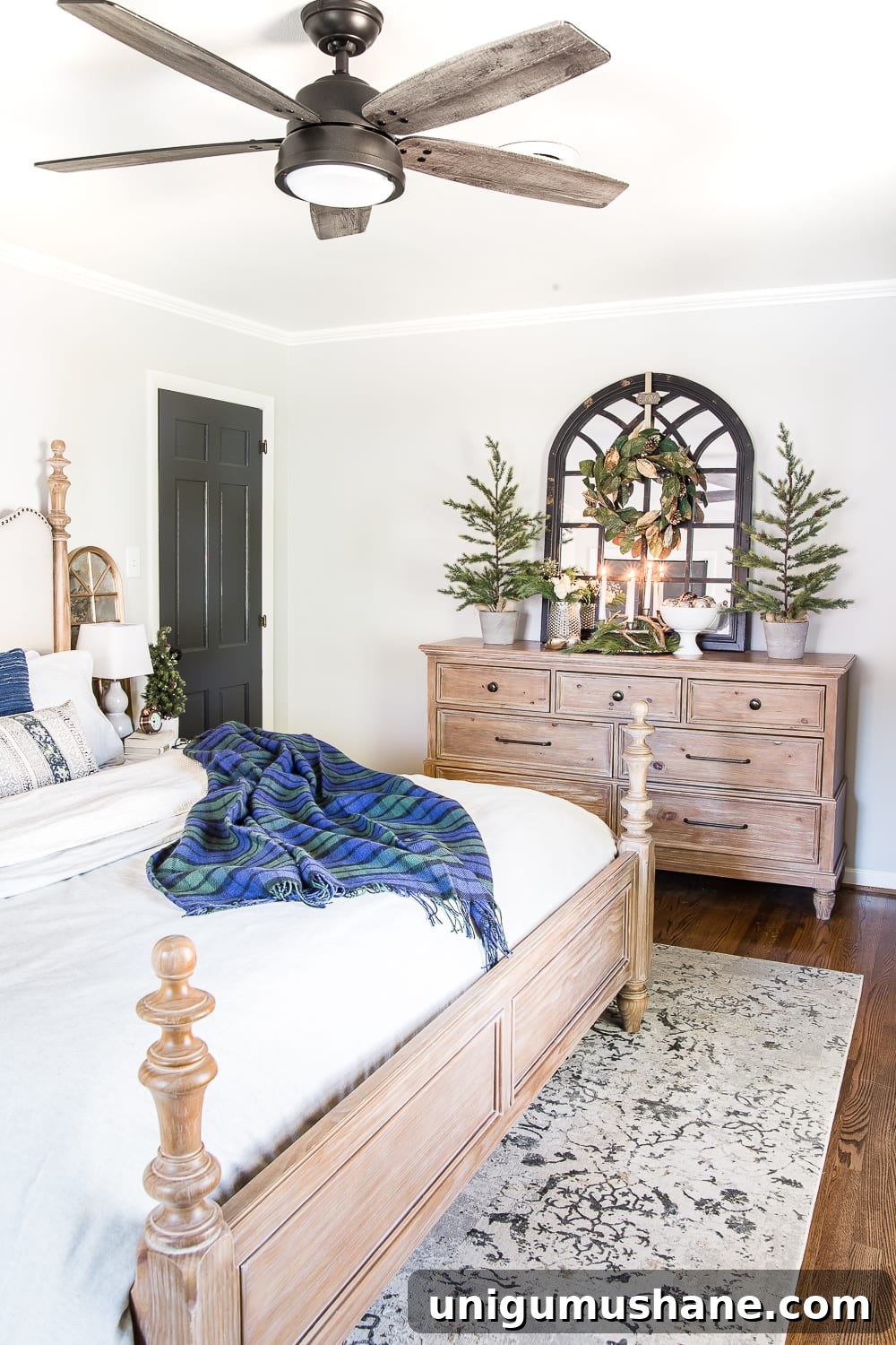 Cozy Blue and Neutral Christmas Bedroom Decor Ideas 8 Blue Christmas Bedroom | blesserhouse.com - A master bedroom decorated for Christmas with neutrals, blues, and greens that transitions easily into winter. #christmasbedroom #bluechristmas