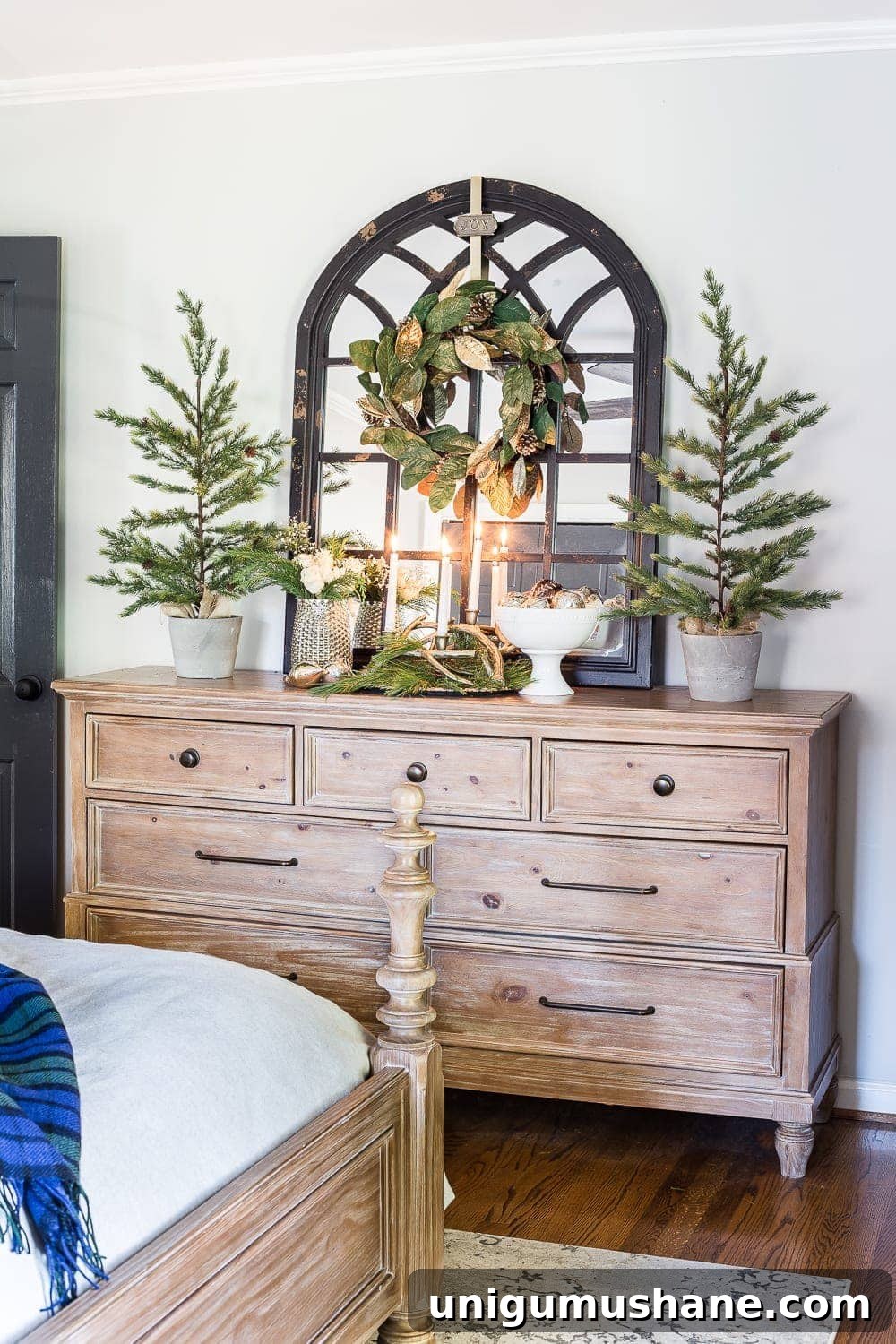 Cozy Blue and Neutral Christmas Bedroom Decor Ideas 9 Blue Christmas Bedroom | blesserhouse.com - A master bedroom decorated for Christmas with neutrals, blues, and greens that transitions easily into winter. #christmasbedroom #bluechristmas