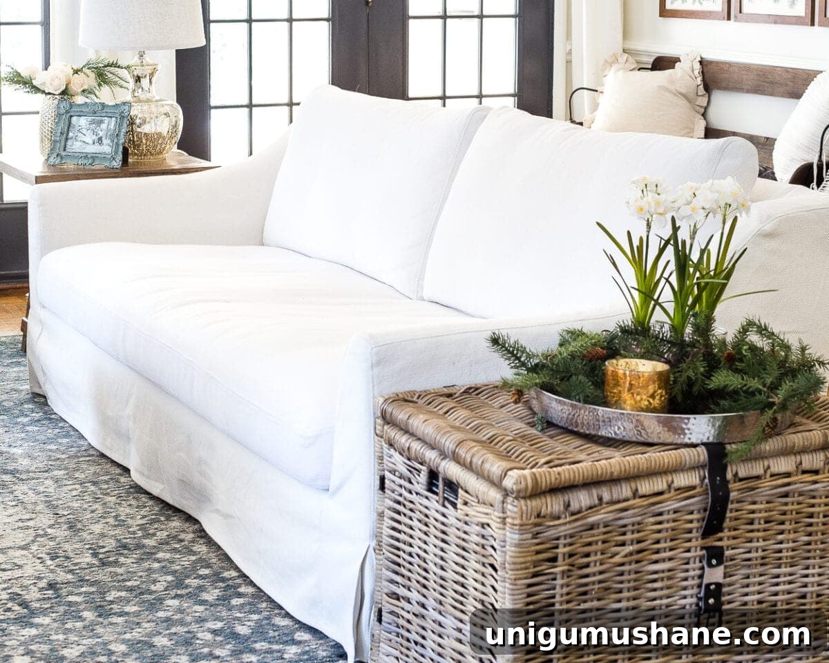 IKEA Farlov Sofa: 8-Month Review — How It's Holding Up 2 A complete review the IKEA Farlov sofa- how it holds up after 8 months with 2 dogs and a preschooler, the pros and cons of owning one, and tips to keep it looking bright white. #sofa #ikea #farlov #slipcover #furniture #livingroom