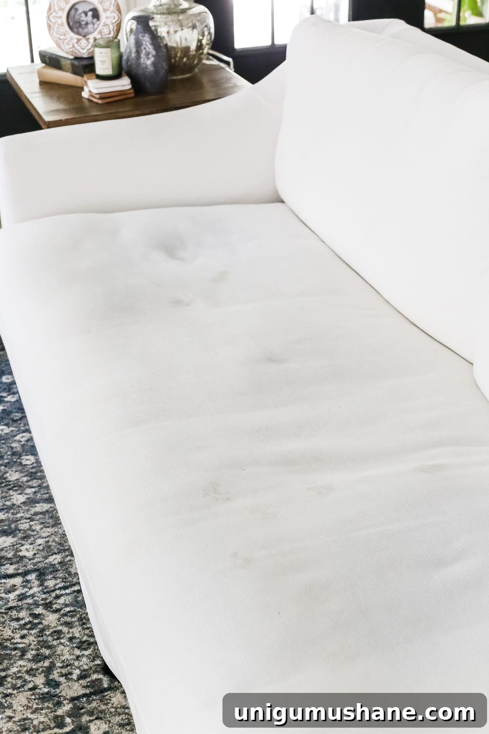 IKEA Farlov Sofa: 8-Month Review — How It's Holding Up 5 A complete review the IKEA Farlov sofa- how it holds up after 8 months with 2 dogs and a preschooler, the pros and cons of owning one, and tips to keep it looking bright white. #sofa #ikea #farlov #slipcover #furniture #livingroom
