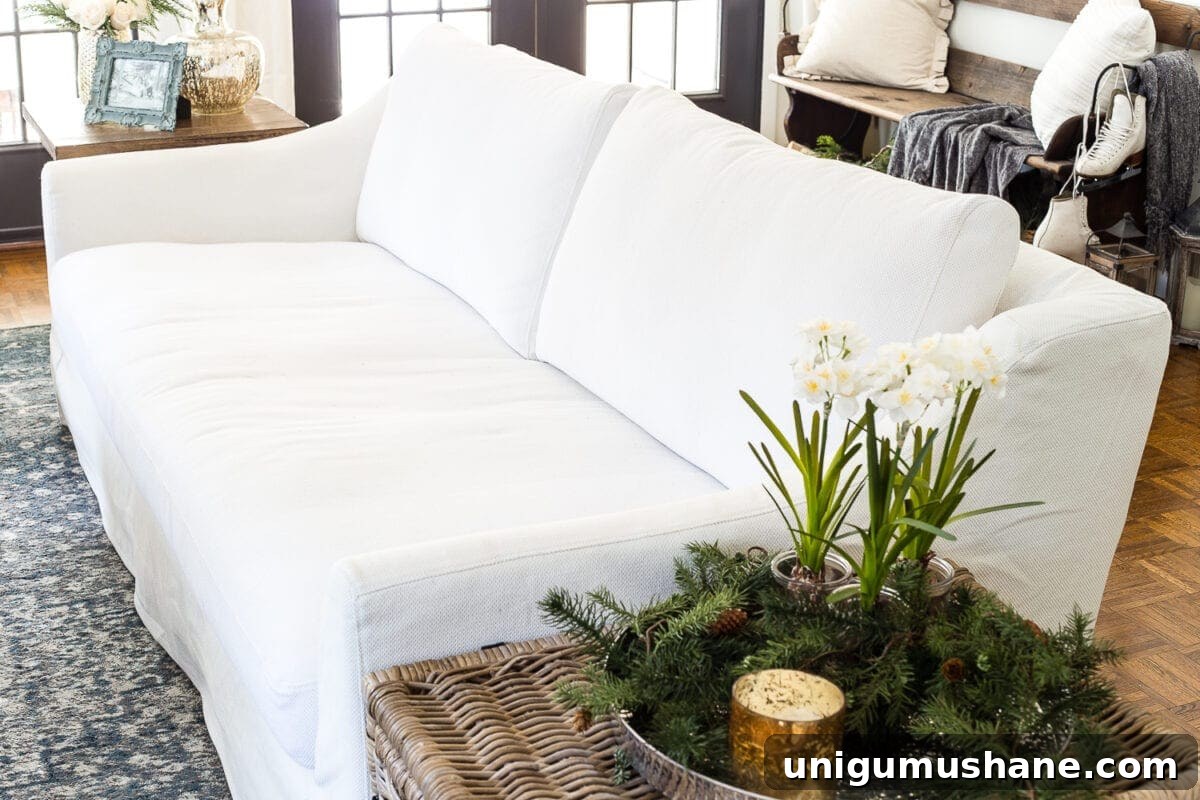 IKEA Farlov Sofa: 8-Month Review — How It's Holding Up 6 A complete review the IKEA Farlov sofa- how it holds up after 8 months with 2 dogs and a preschooler, the pros and cons of owning one, and tips to keep it looking bright white. #sofa #ikea #farlov #slipcover #furniture #livingroom