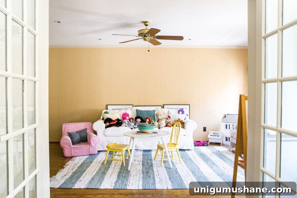 DIY Built-In Bookcases for Your Playroom 2 An easy to follow step-by-step tutorial showing how to build bookcase built-ins using IKEA Billy bookcases. #IKEAhack #homeimprovement #build #playroom Playroom before