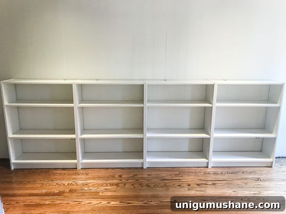 DIY Built-In Bookcases for Your Playroom 9 An easy to follow step-by-step tutorial showing how to build bookcase built-ins using IKEA Billy bookcases. #IKEAhack #homeimprovement #build #playroom