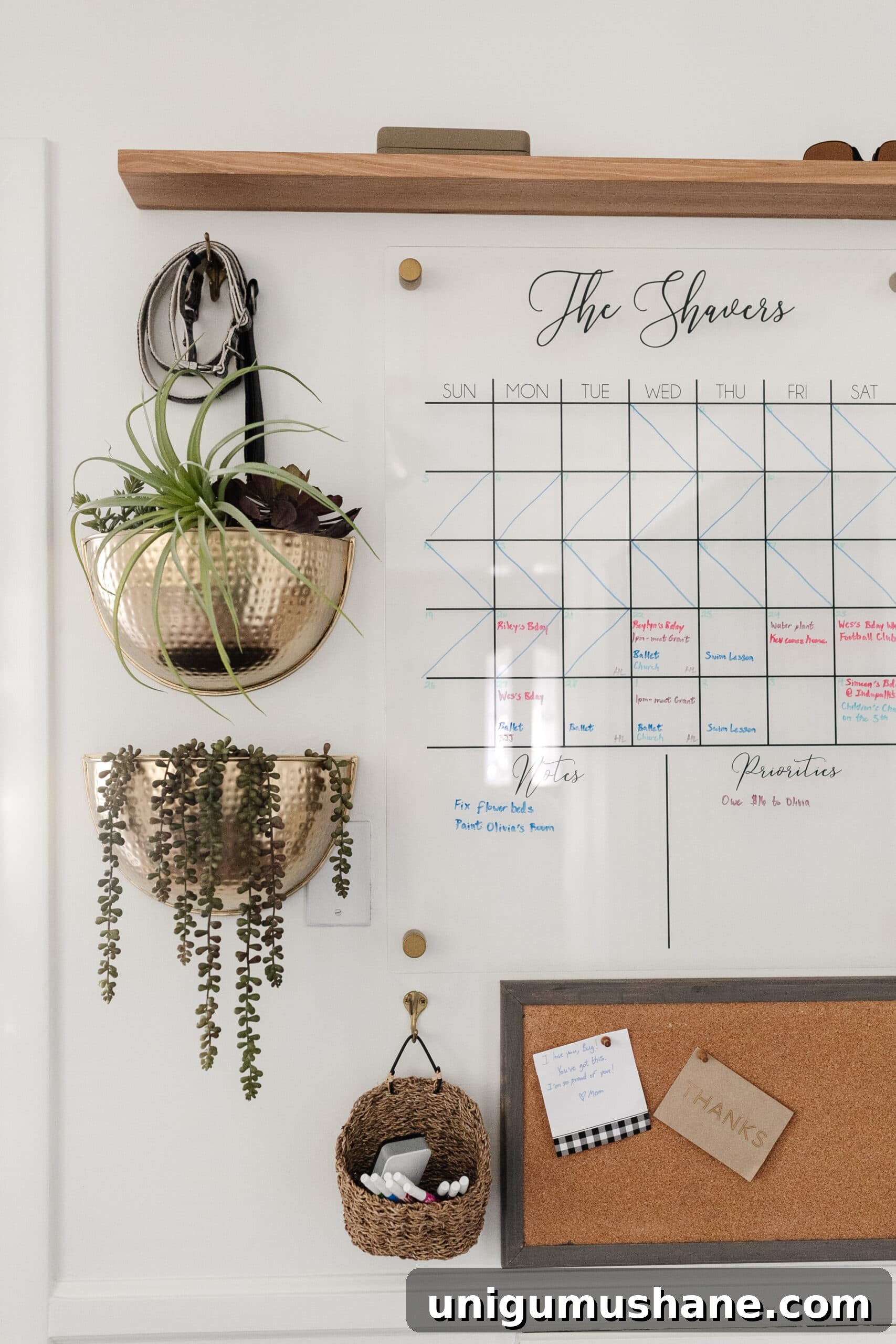Family Command Center: Practical Setup for an Organized Home 10 family command center with wall calendar, brass planters, shelf, and memo board