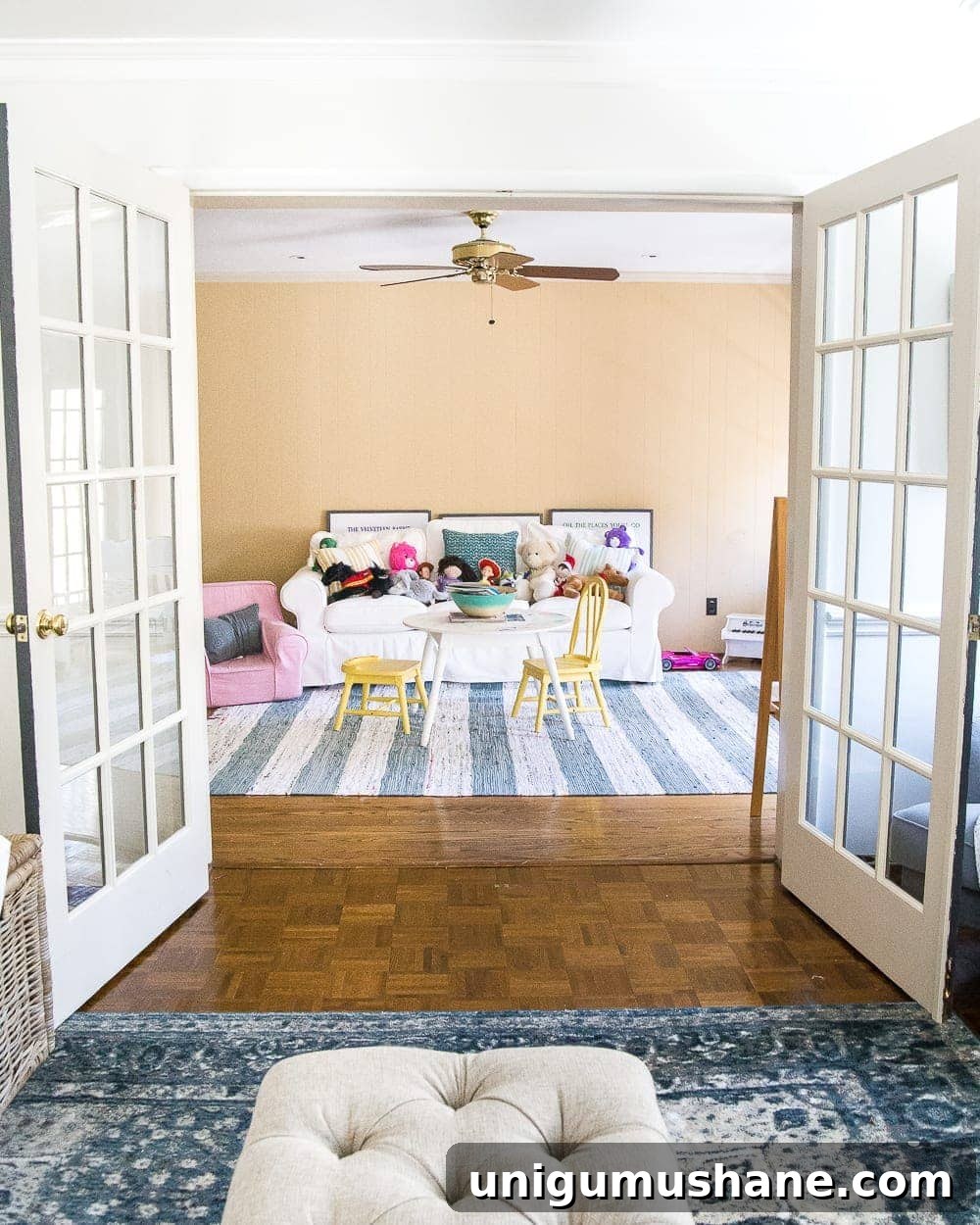 Playroom Makeover Reveal: Before and After Ideas 2 A dated, unorganized playroom gets a bright and whimsical makeover with organizational strategies, ideas for adding function, and DIY-able projects to create the perfect kid's space on a budget. #kidsroom #playroom #kidsdecor #toyorganizing