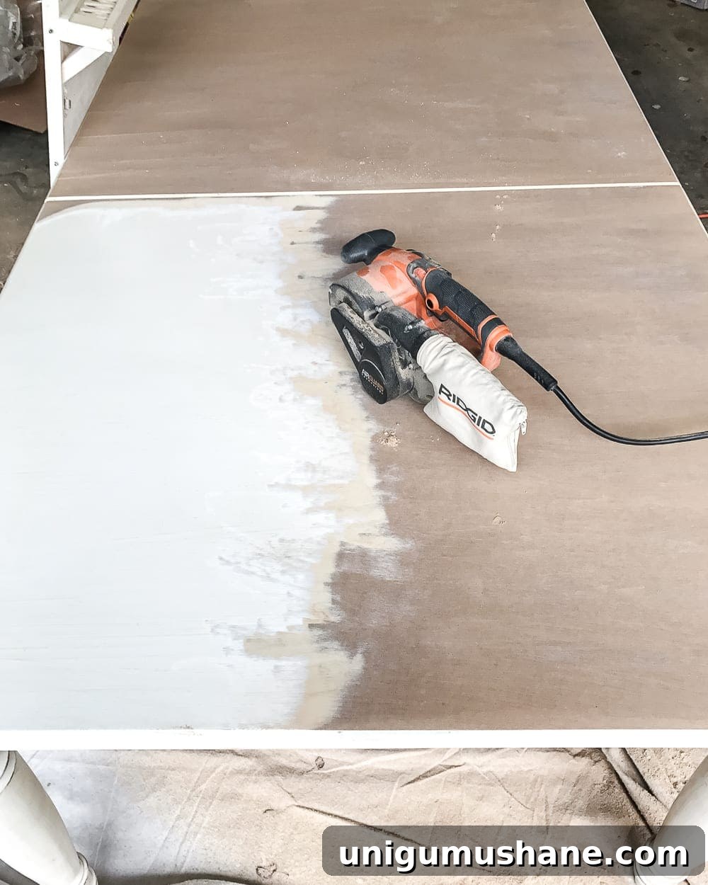 DIY Retrofit to Upgrade Your Dining Table Top 3 A tutorial for how to build a retrofitted table top to fit over any existing table using Minwax Dark Walnut stain. #build #furniturebuilding #tabletop #diningtable #diytable #farmhousetable #diyfurniture #woodworking #furnituremakeover #tablemakeover #minwax #woodstain #walnut