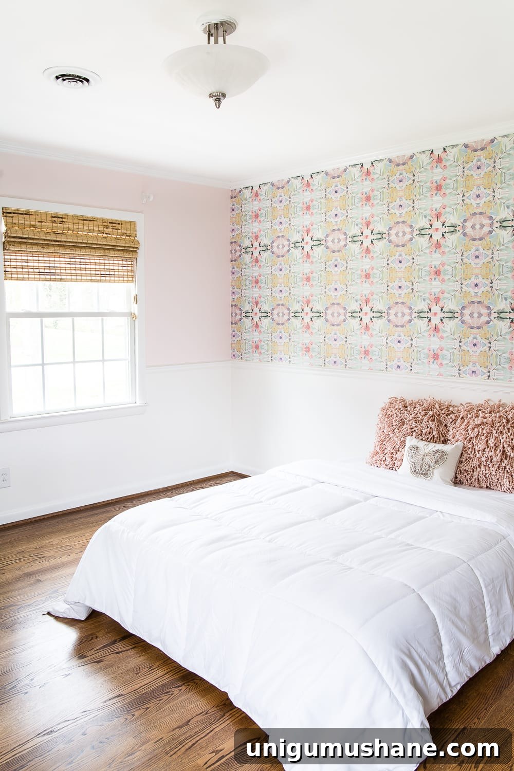 Our Little Girl's Bedroom Wallpaper Reveal 3 A sweet pastel little girl bedroom makeover with Behr My Sweetheart and retro wallpaper to transition into pre-teen/teenage years. #girlbedroom #kidsdecor #wallpaper #pinkpaint