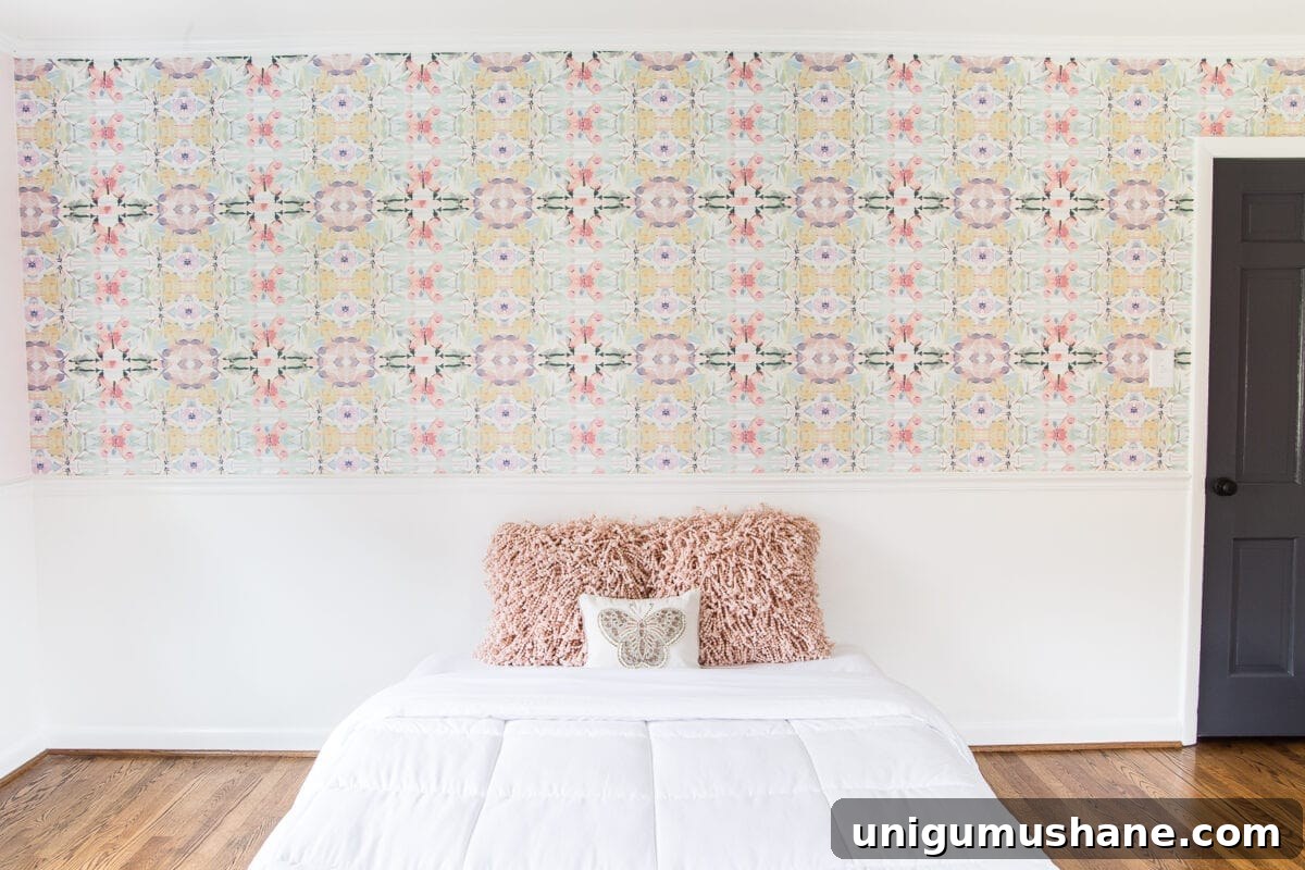 Our Little Girl's Bedroom Wallpaper Reveal 5 A sweet pastel little girl bedroom makeover with Behr My Sweetheart and retro wallpaper to transition into pre-teen/teenage years. #girlbedroom #kidsdecor #wallpaper #pinkpaint