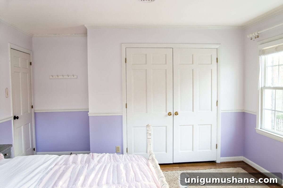 Our Little Girl's Bedroom Wallpaper Reveal 4 A sweet pastel little girl bedroom makeover with Behr My Sweetheart and retro wallpaper to transition into pre-teen/teenage years. #girlbedroom #kidsdecor #wallpaper #pinkpaint