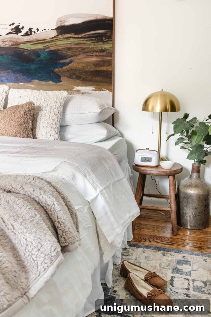 using a stool beside a bed for a skinny bedside table in a temporary guest bedroom with an air mattress