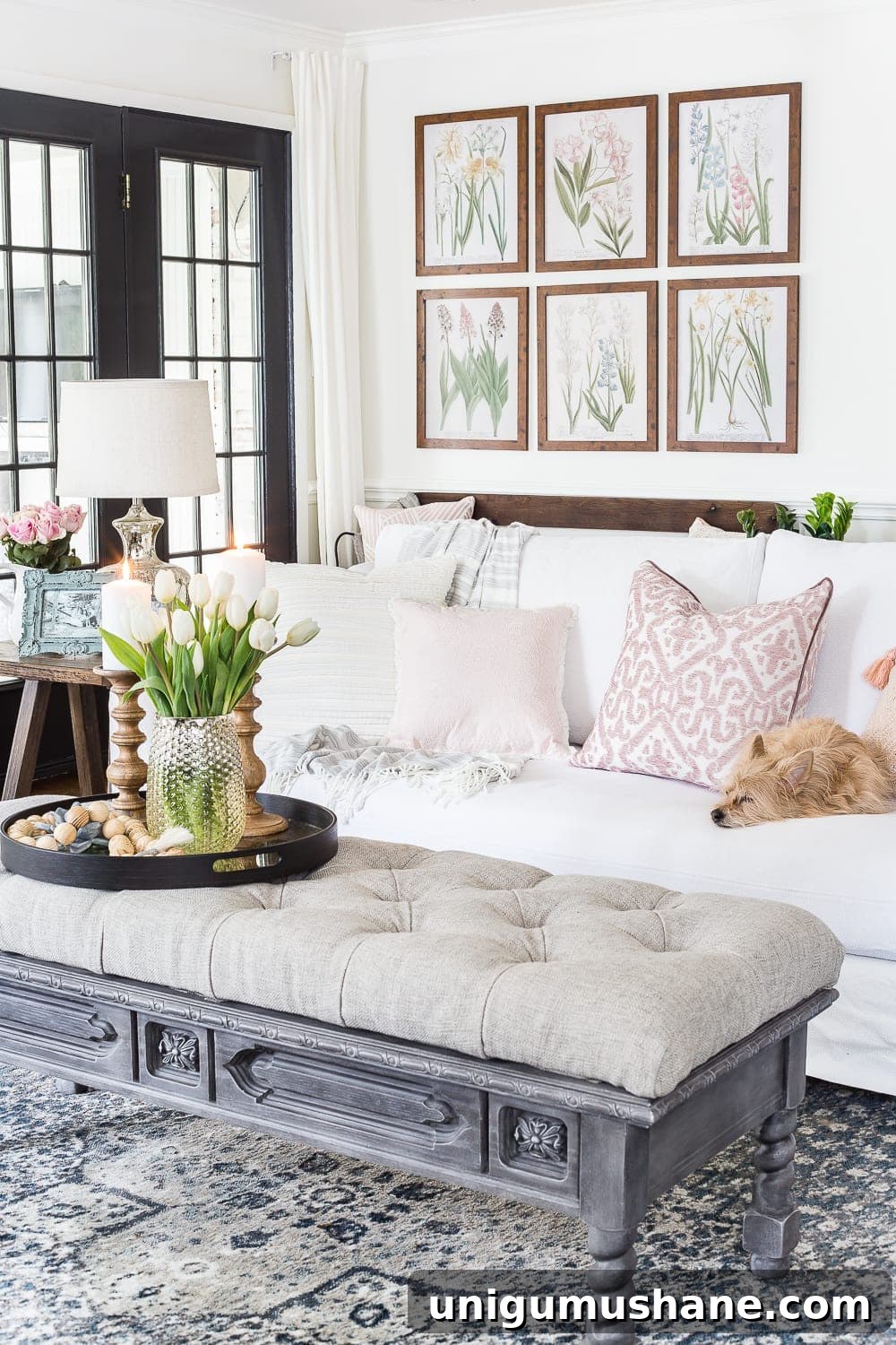 Spring Living Room Tour: Fresh Decor Ideas 4 A living room gets a spring refresh with simple florals, candle light, and light fabrics. #springdecor #livingroom #springlivingroom #springaccents #livingroomdesign #livingroomdecor #budgetdecor