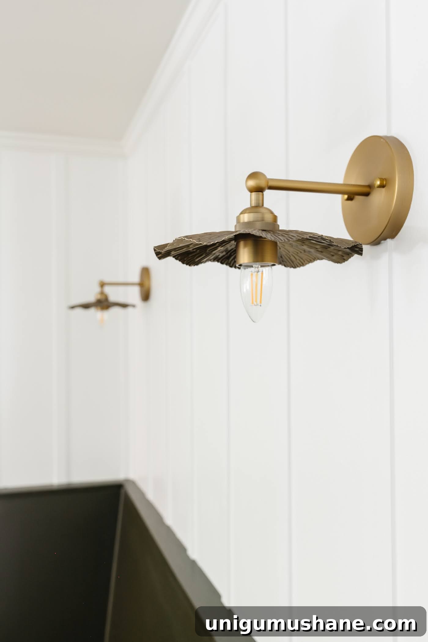Vintage Wall Sconces: 32 Stylish Picks for Every Room 3 flower vintage wall sconces on a white board and batten wall