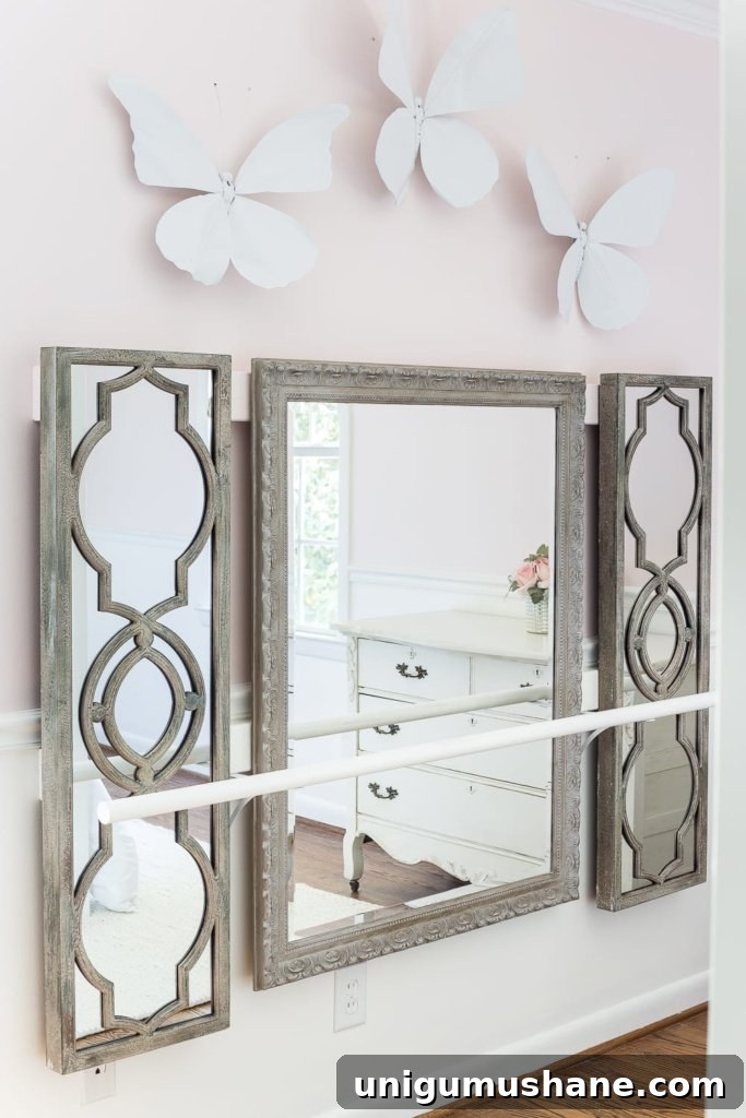 How to make a ballet barre with mirrors and shelf brackets and how to hang wall decor on a chair rail, board and batten, or molding #balletbarre #kidsdecor #girldecor #girlbedroom #girlroom #kidsroom #walldecor #hanginghack #wallhack #diywalldecor 