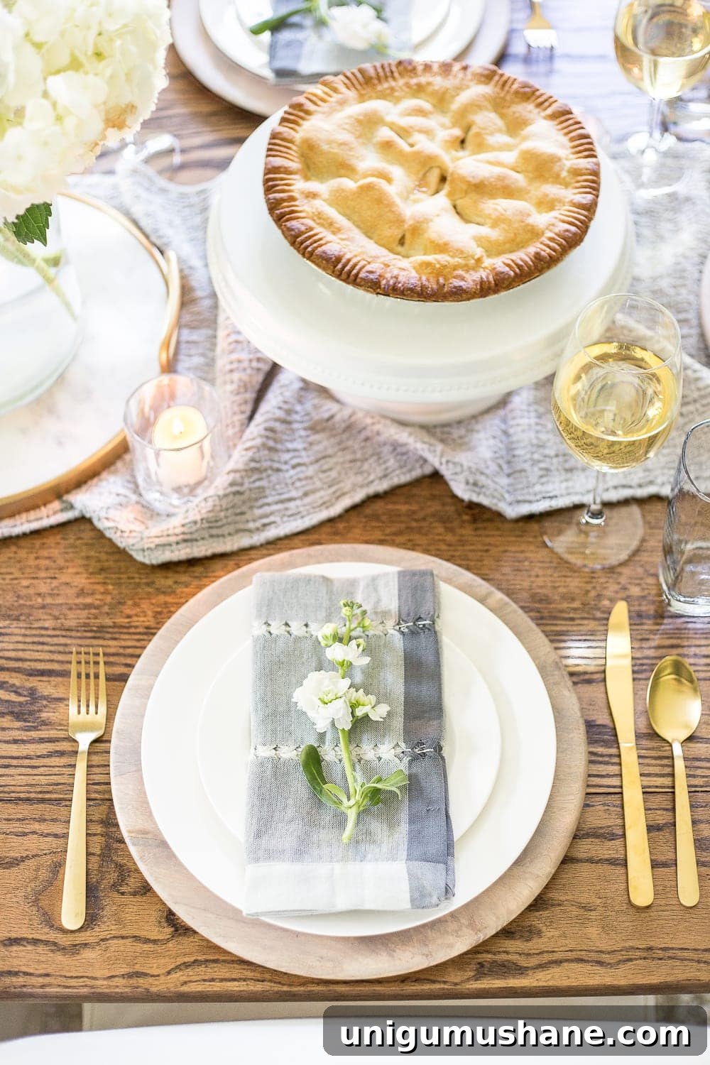 Neutral decor and layered textures in a summer dining room.