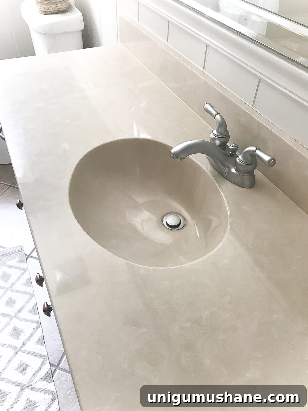 Painted Sink, Countertop, Tub and Shower: 8-Month Update 2 How to paint a sink, countertop, tub, and shower for $100 and how to make it last using Rustoleum Tub & Tile Refinishing Kit #bathroom #bathroommakeover #diyproject #homeimprovement #paintedsink #paintedcountertop #paintedtub #paintedshower