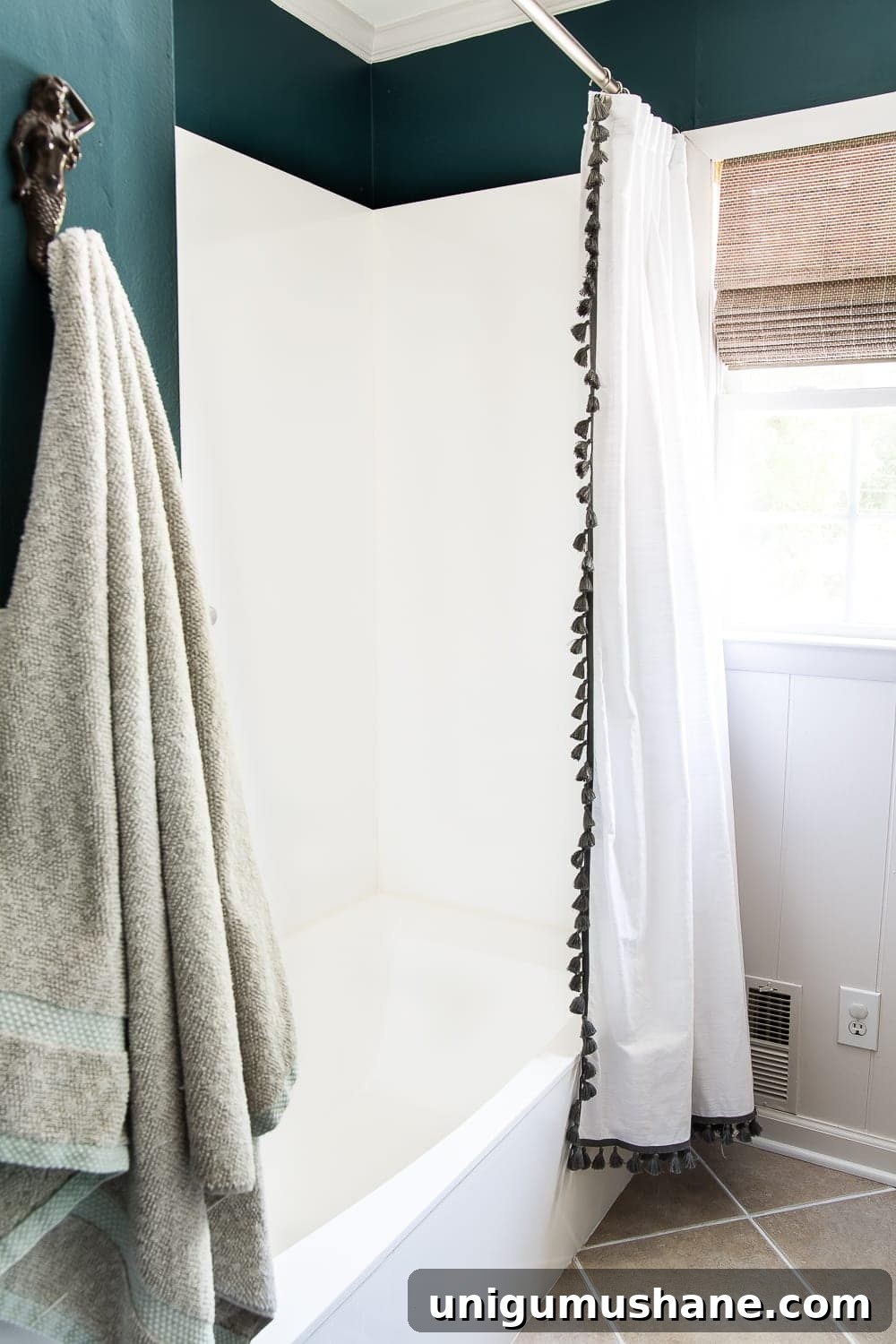 Painted Sink, Countertop, Tub and Shower: 8-Month Update 10 How to paint a sink, countertop, tub, and shower for $100 and how to make it last using Rustoleum Tub & Tile Refinishing Kit #bathroom #bathroommakeover #diyproject #homeimprovement #paintedsink #paintedcountertop #paintedtub #paintedshower