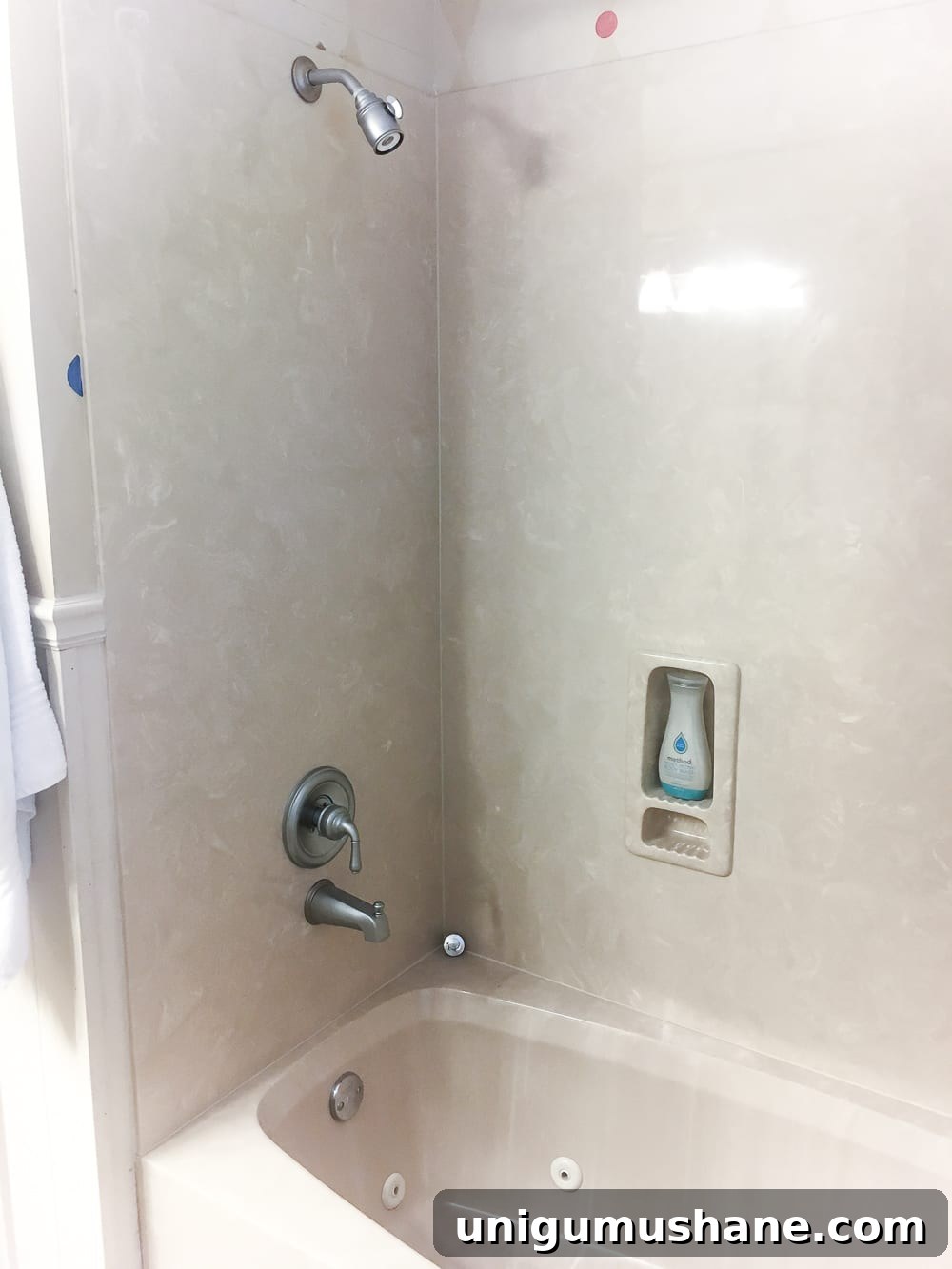 Painted Sink, Countertop, Tub and Shower: 8-Month Update 3 How to paint a sink, countertop, tub, and shower for $100 and how to make it last using Rustoleum Tub & Tile Refinishing Kit #bathroom #bathroommakeover #diyproject #homeimprovement #paintedsink #paintedcountertop #paintedtub #paintedshower