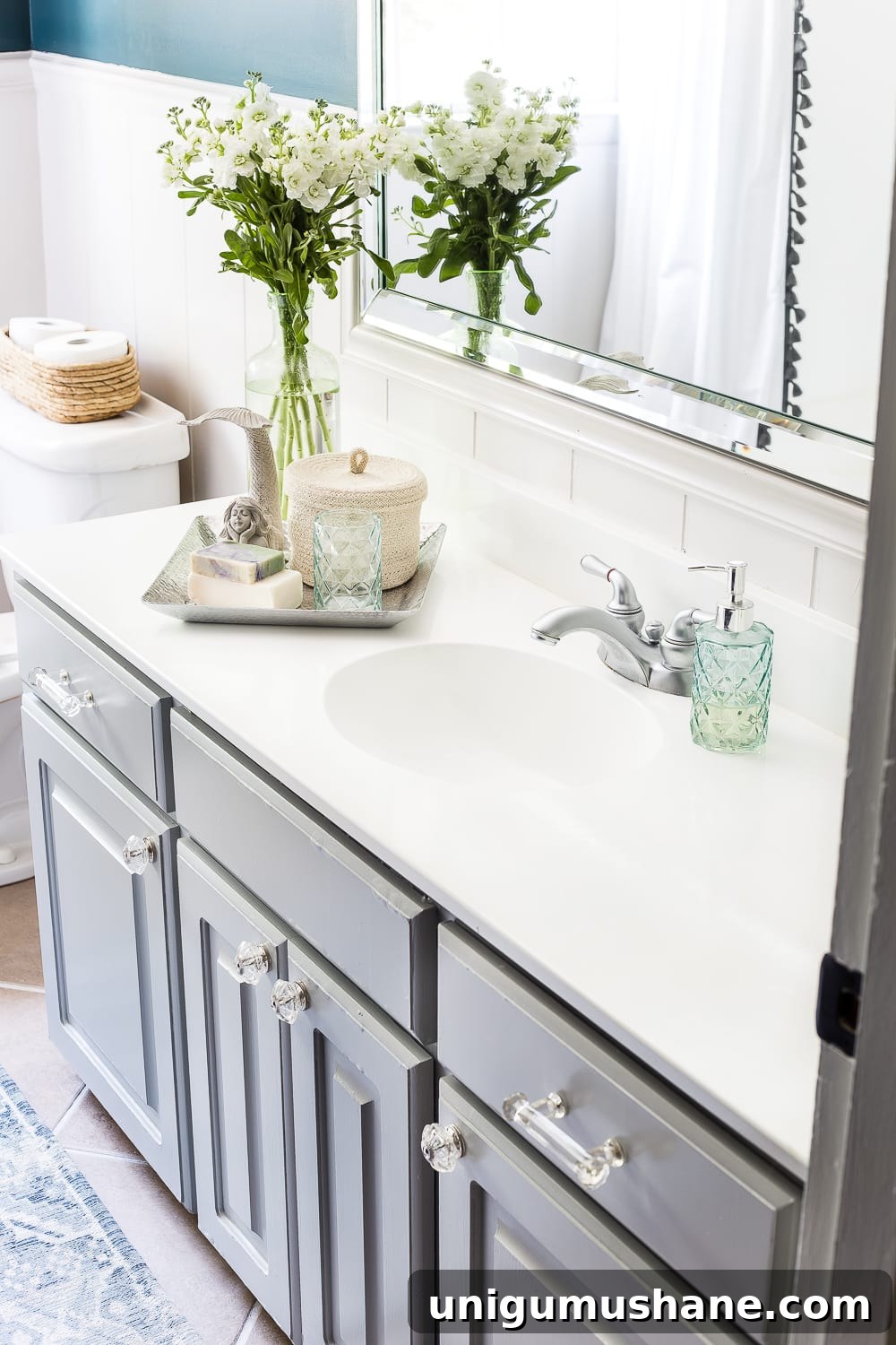Painted Sink, Countertop, Tub and Shower: 8-Month Update 8 How to paint a sink, countertop, tub, and shower for $100 and how to make it last using Rustoleum Tub & Tile Refinishing Kit #bathroom #bathroommakeover #diyproject #homeimprovement #paintedsink #paintedcountertop #paintedtub #paintedshower