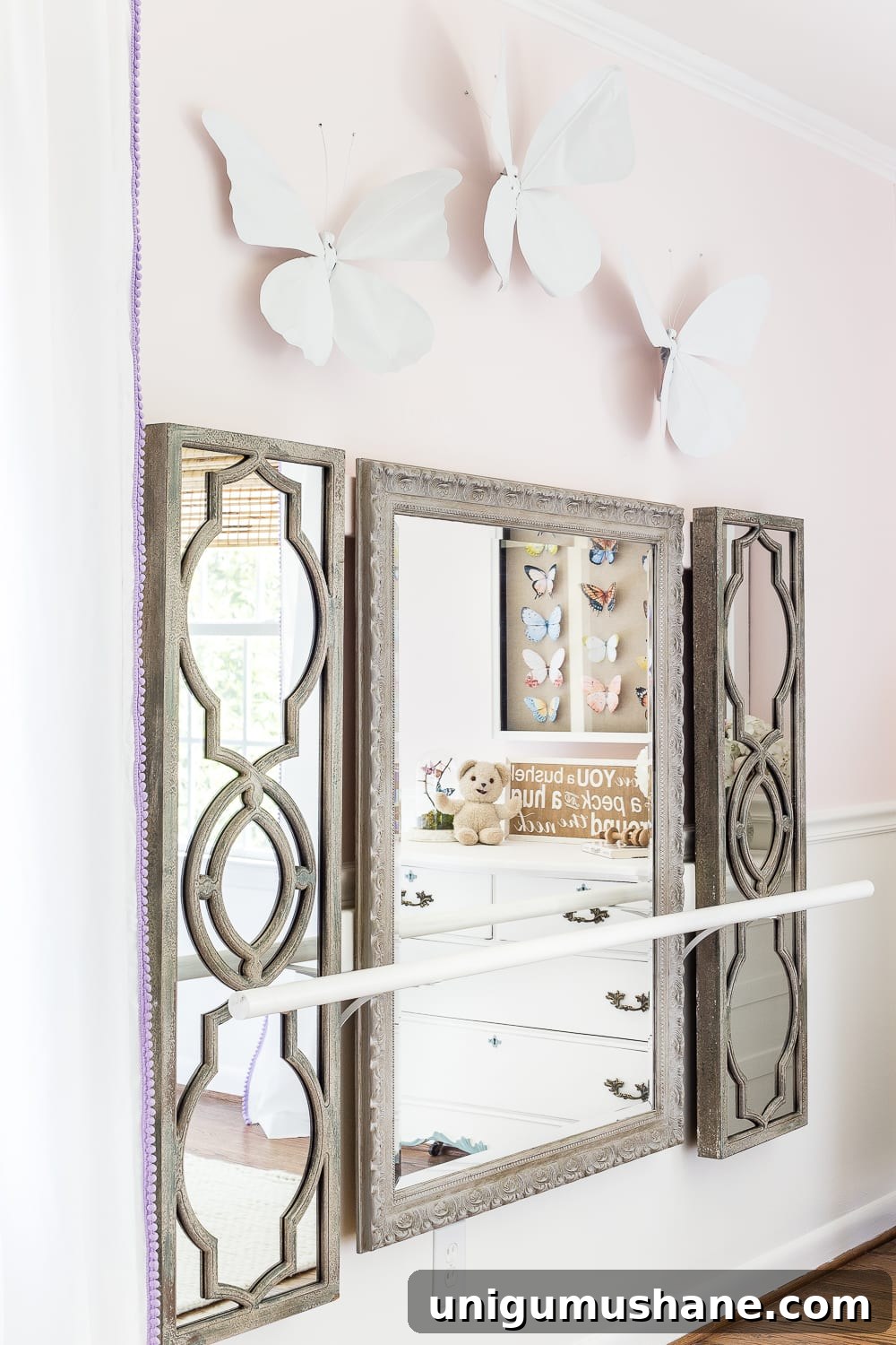 Little Girl's Butterfly Bedroom Makeover Reveal 10 A little girl bedroom makeover with a butterfly theme full of thrifty makeovers, DIYable projects, and Anthropologie style knock-offs. #girlbedroom #littlegirlbedroom #girlroom #littlegirlroom #kidsspaces #kidsdecor #kidsroom #kidsdiy #bedroommakeover #kidsroommakeover #girlbedroommakeover