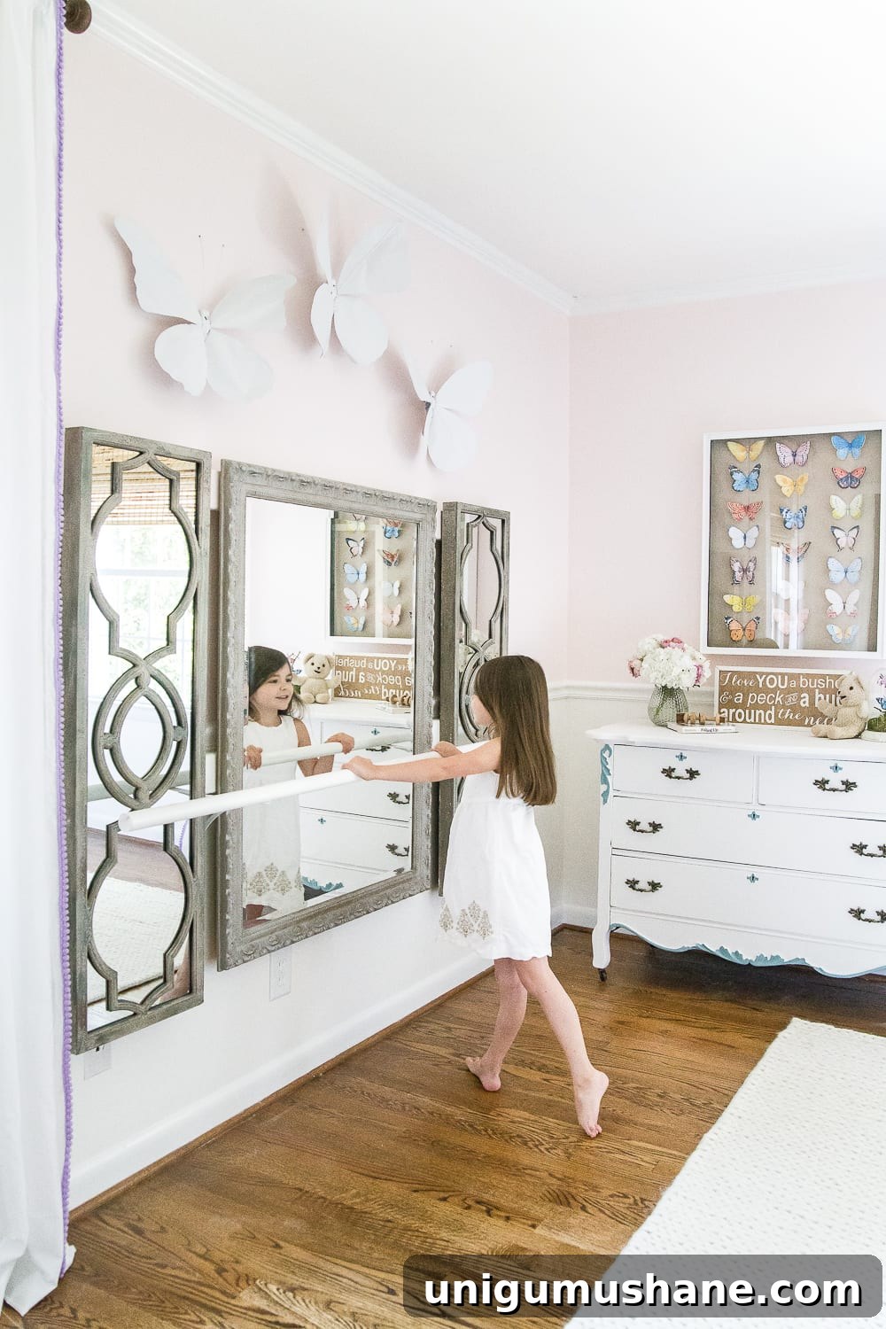 Little Girl's Butterfly Bedroom Makeover Reveal 14 A little girl bedroom makeover with a butterfly theme full of thrifty makeovers, DIYable projects, and Anthropologie style knock-offs. #girlbedroom #littlegirlbedroom #girlroom #littlegirlroom #kidsspaces #kidsdecor #kidsroom #kidsdiy #bedroommakeover #kidsroommakeover #girlbedroommakeover
