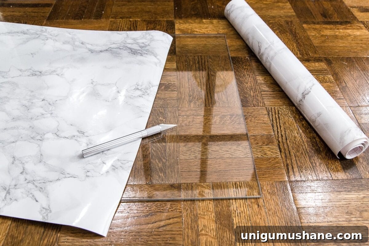 How to cover a glass table top with marble contact paper