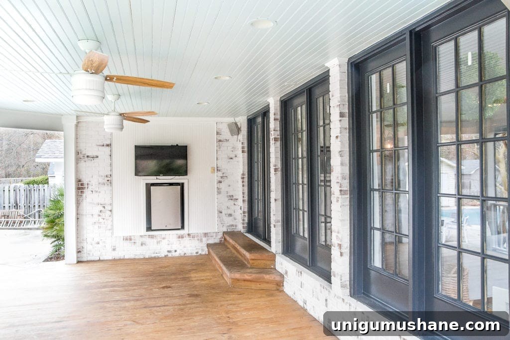 DIY Screened Porch and Outdoor Curtains for Under $100 2 limewashed brick back porch with haint blue ceiling