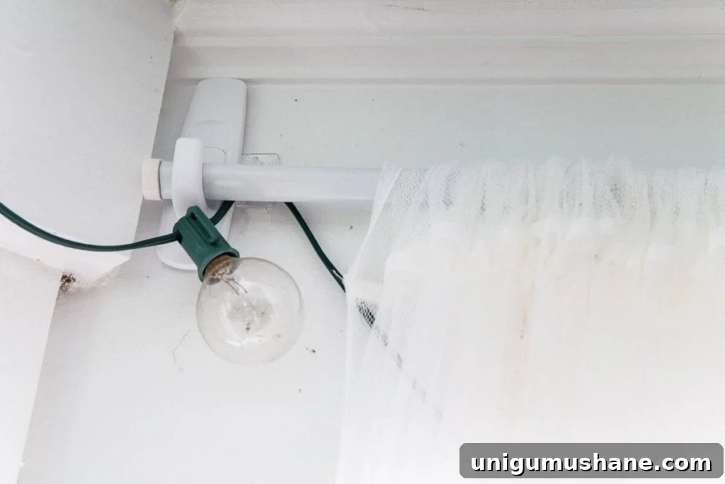 DIY Screened Porch and Outdoor Curtains for Under $100 4 how to hang curtain rods without damaging your walls