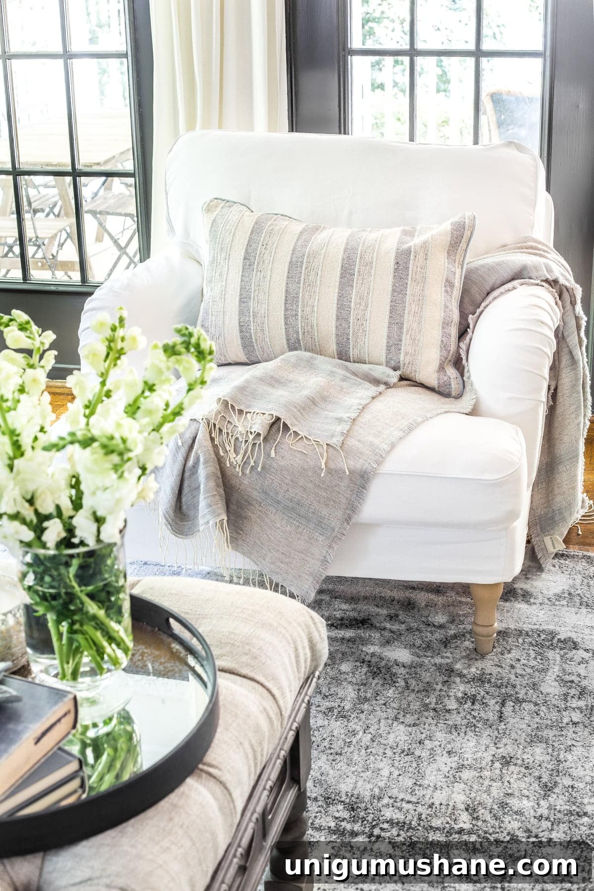 23 Small Room Tricks That Make Any Space Look Bigger 15 living room armchair with exposed legs to make a small room look bigger