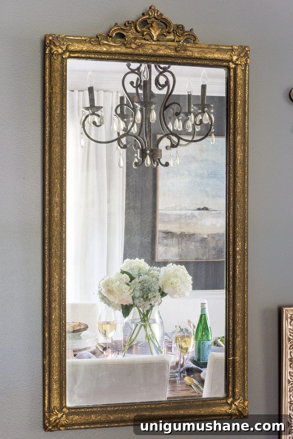 23 Small Room Tricks That Make Any Space Look Bigger 16 mirror in a dining room with a dining table reflection