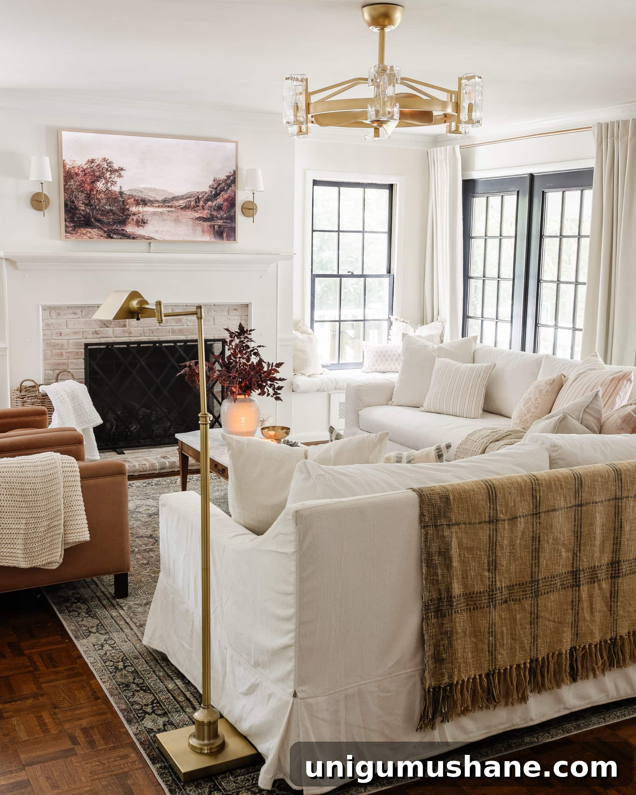23 Small Room Tricks That Make Any Space Look Bigger 24 monochromatic living room with white sofas, white walls, and white curtains