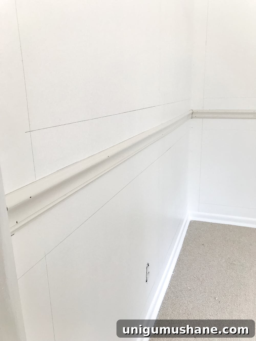 mark walls for picture frame molding using a 4" board as a spacer