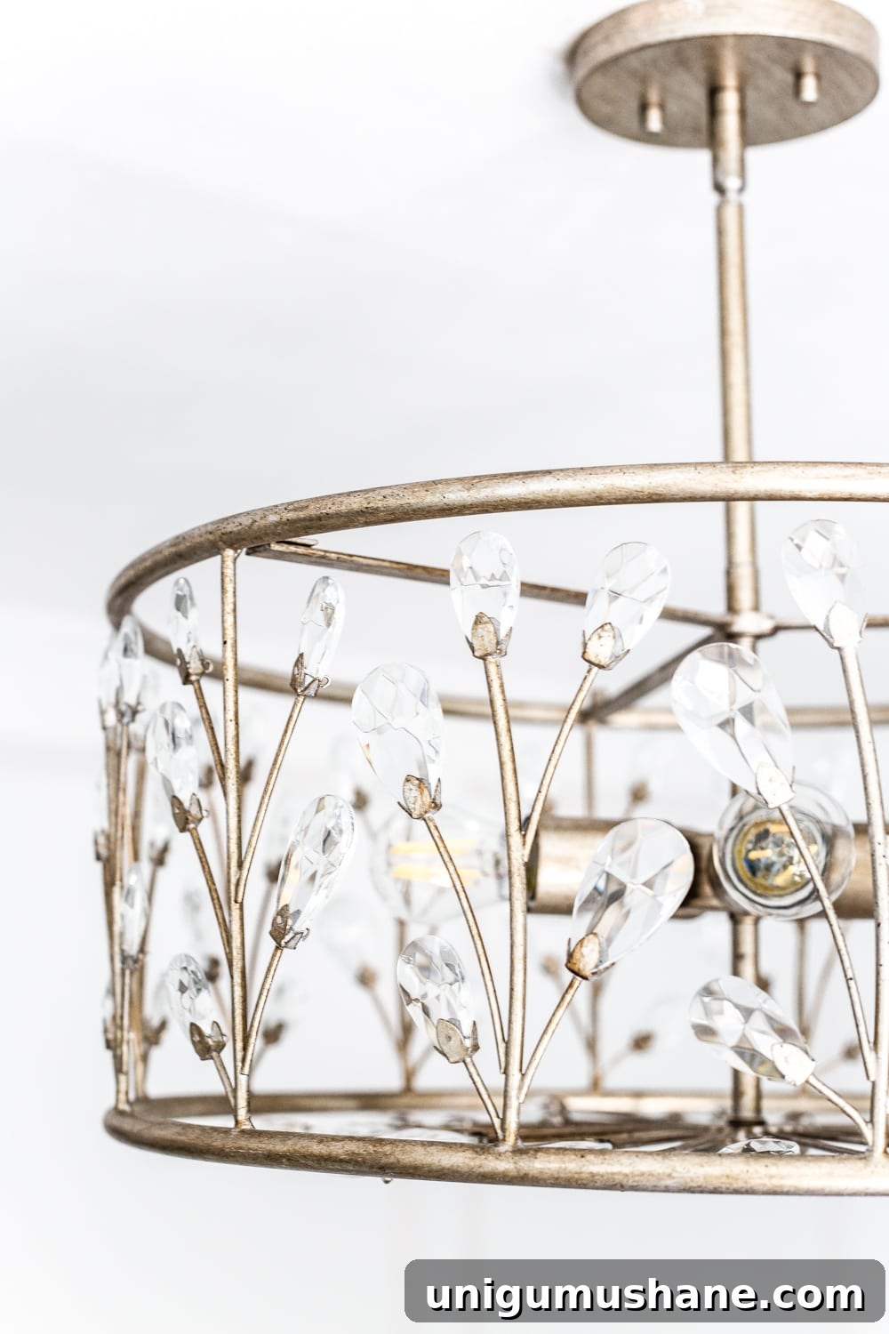 How to Update a Nursery Light Fixture 7 A feminine, vintage, glam lighting update for a baby girl's nursery makeover. #nurserylighting #lightfixture #glamdecor #vintagedecor