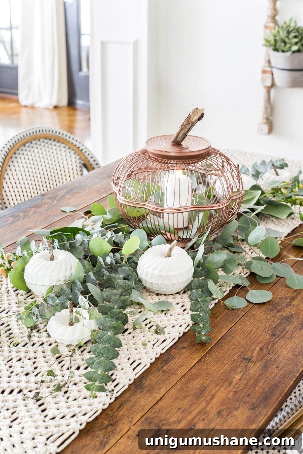 Fall Pumpkin Decor from Wire Baskets and Bundt Pans 14 Fall centerpiece with DIY pumpkin lantern using thrifted wire bread baskets and craft pumpkins using mini bundt pan Jello molds