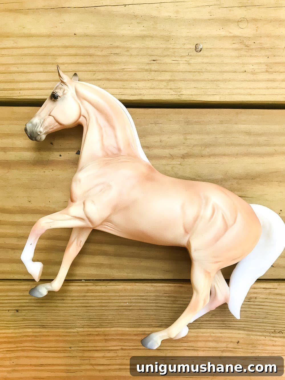 How to Make a Concrete Horse Figurine for Equestrian Decor 2 How to turn a toy horse figurine into a designer-inspired concrete equestrian statuette using just paint, wood craft, and glue. #thriftymakeover