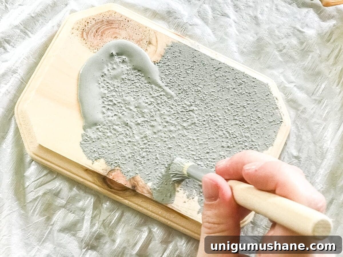 How to Make a Concrete Horse Figurine for Equestrian Decor 4 How to turn a toy horse figurine into a designer-inspired concrete equestrian statuette using just paint, wood craft, and glue. #thriftymakeover