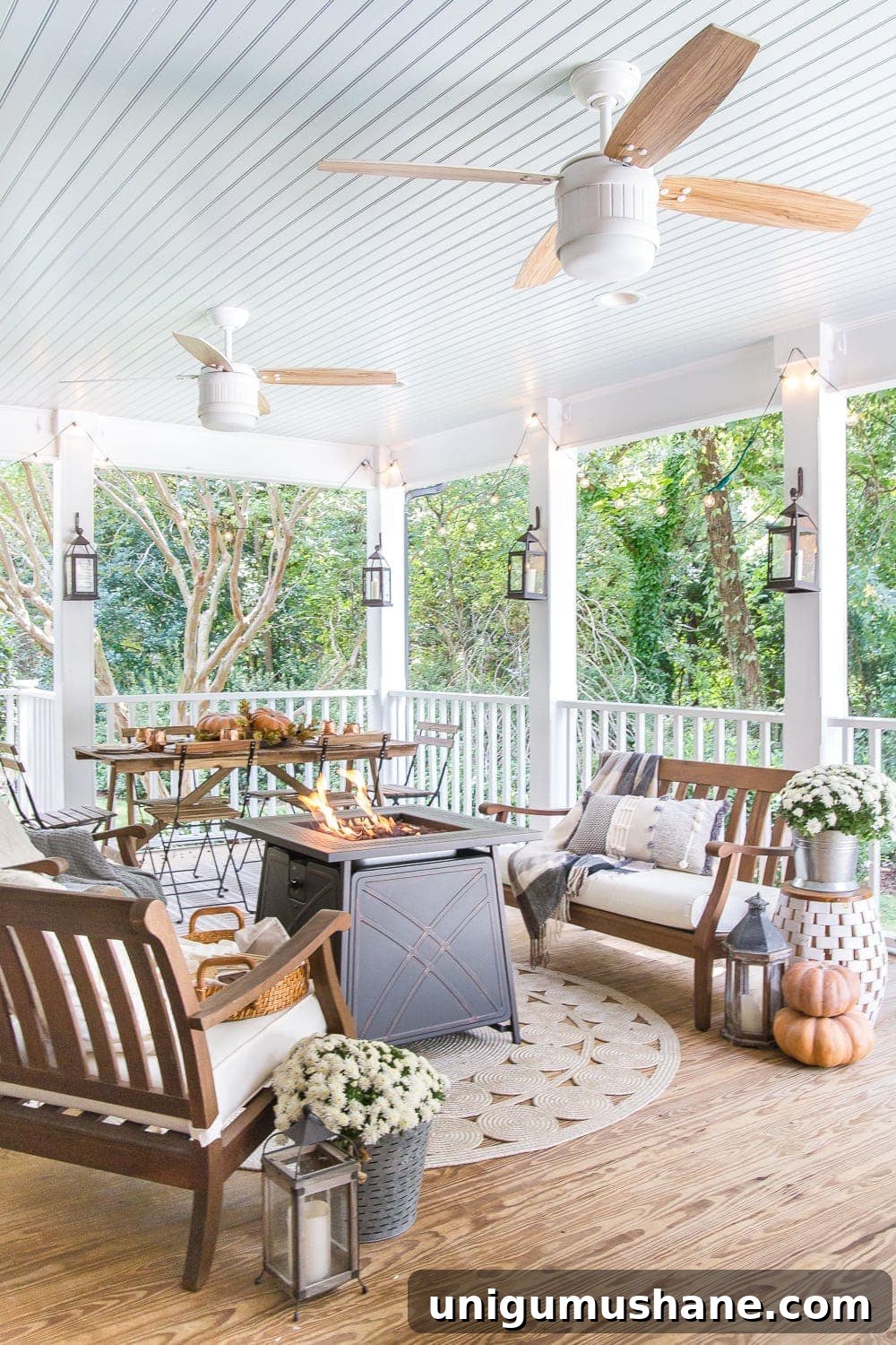 Fall Porch Tour and Cozy Outdoor Decor Ideas 2 Cozy fall porch with pumpkins, a gas fire pit, lanterns and string lights
