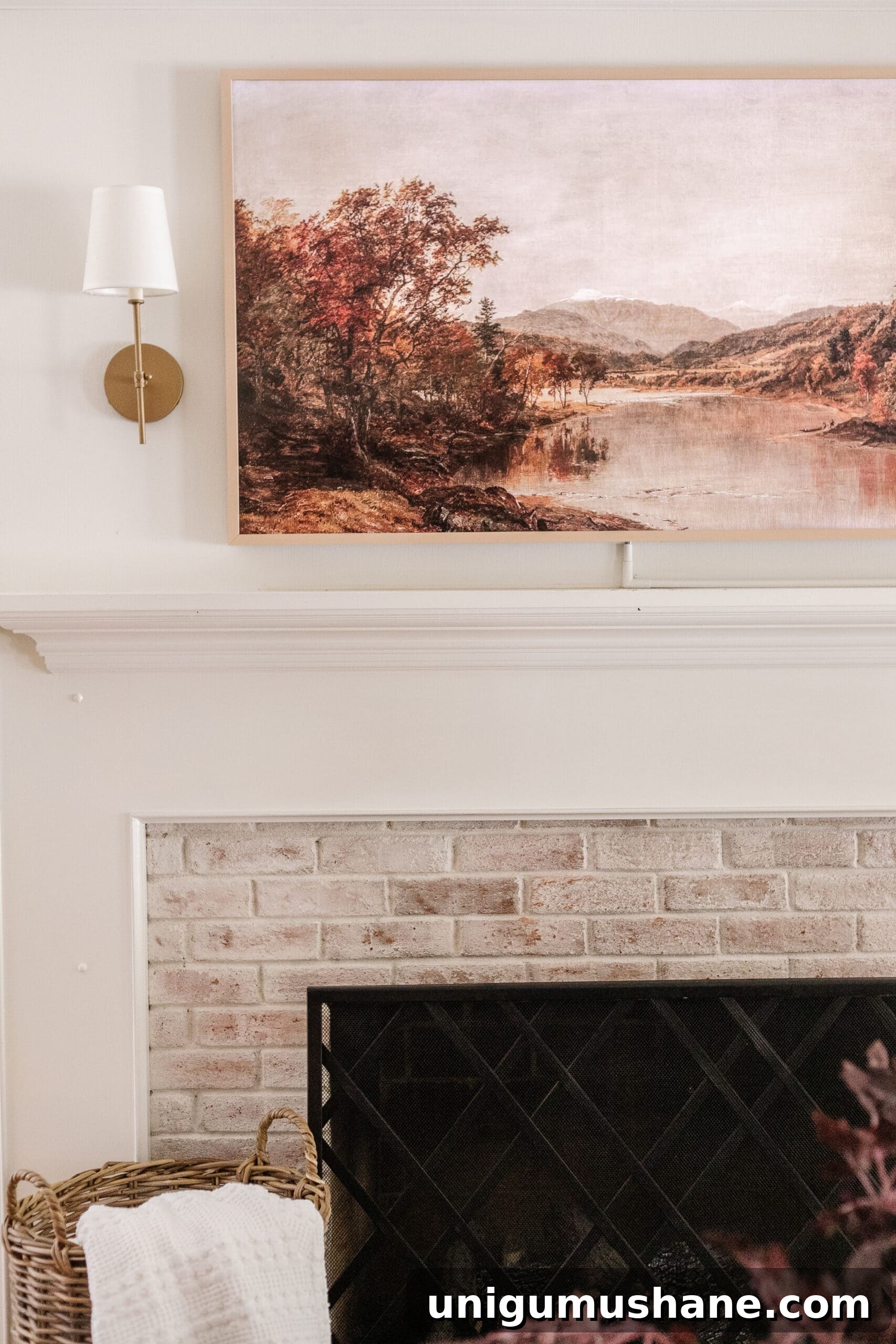 Avoid These Home Decorating Mistakes 9 samsung frame TV with art above fireplace
