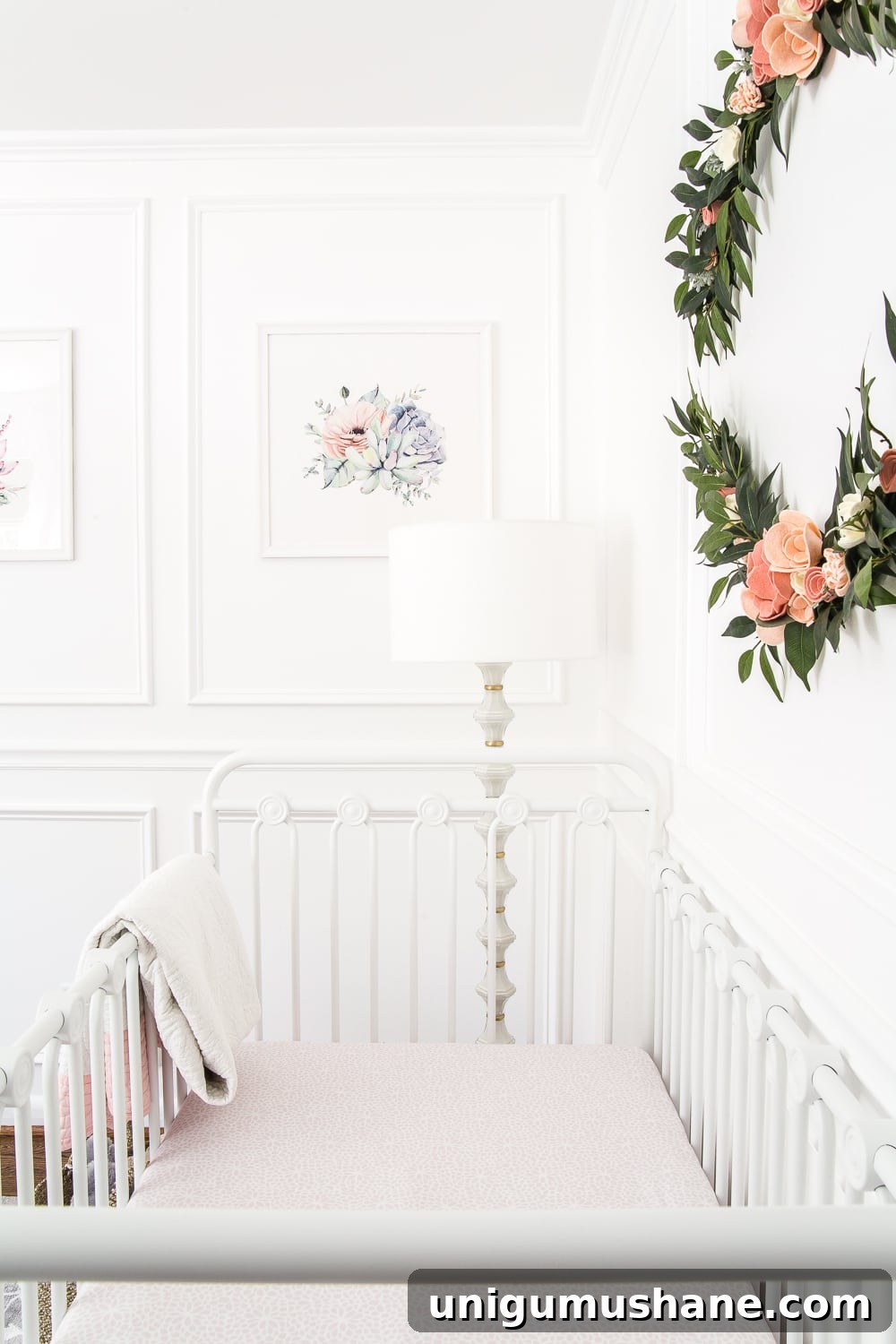 White Floral Baby Nursery Makeover: Before and After Reveal 11 An all white nursery makeover room reveal with classic, vintage style furniture, Anthropologie-inspired patterns and textures, and floral accents.