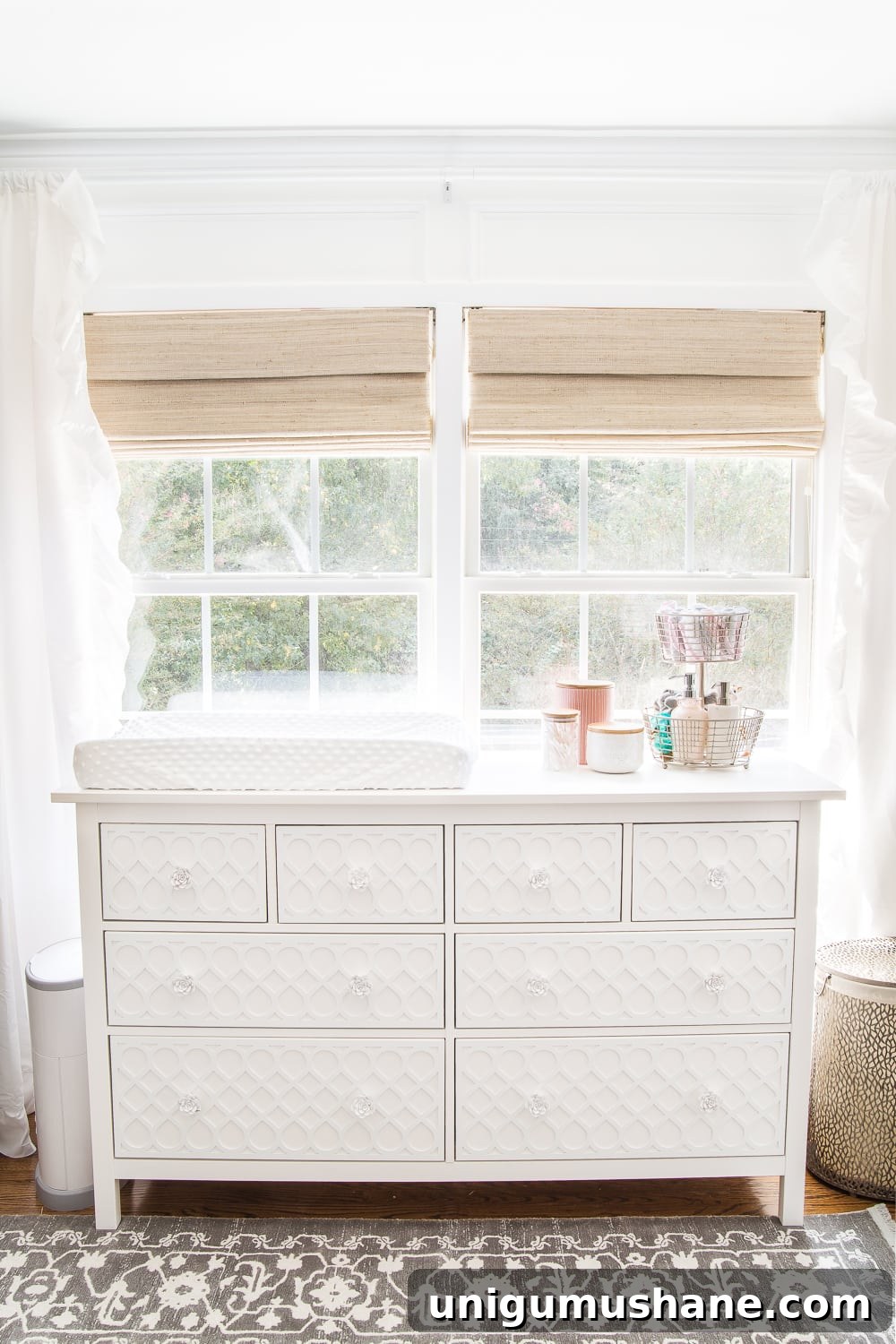 White Floral Baby Nursery Makeover: Before and After Reveal 14 An all white nursery makeover room reveal with classic, vintage style furniture, Anthropologie-inspired patterns and textures, and floral accents.