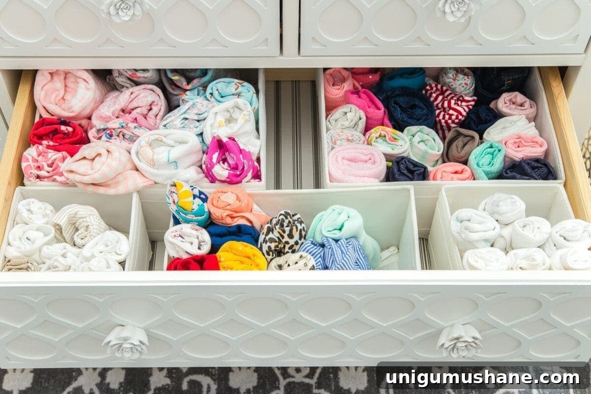 Nursery Organization Tour: Baby Room Storage and Layout 14 Nursery Organization | Dresser drawers with dividers to store baby clothes in categories