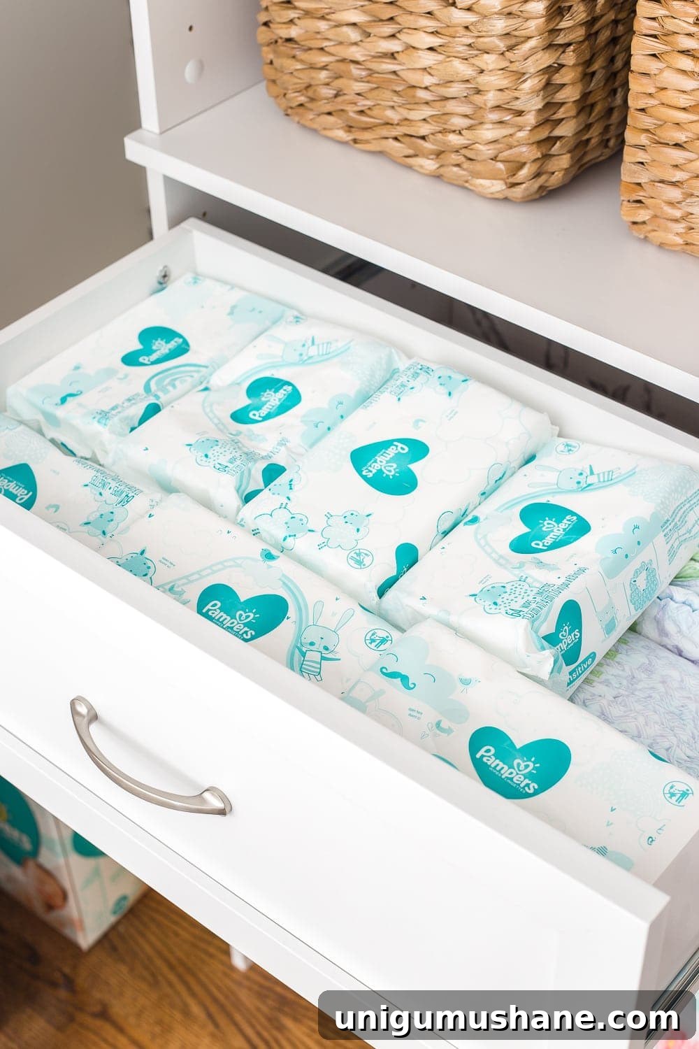 Nursery Closet Makeover Reveal with Free Printable Dividers 12 Nursery closet organization with shelving and built-in drawers for diaper storage