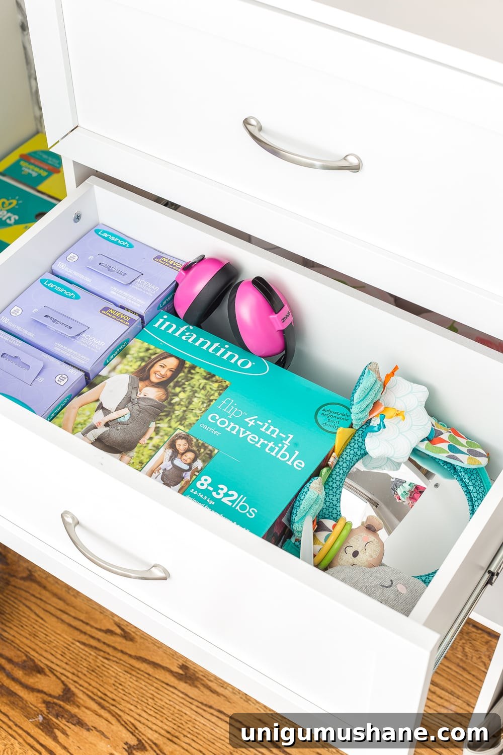 Nursery Closet Makeover Reveal with Free Printable Dividers 13 Nursery closet organization with shelving and built-in drawers for baby essentials